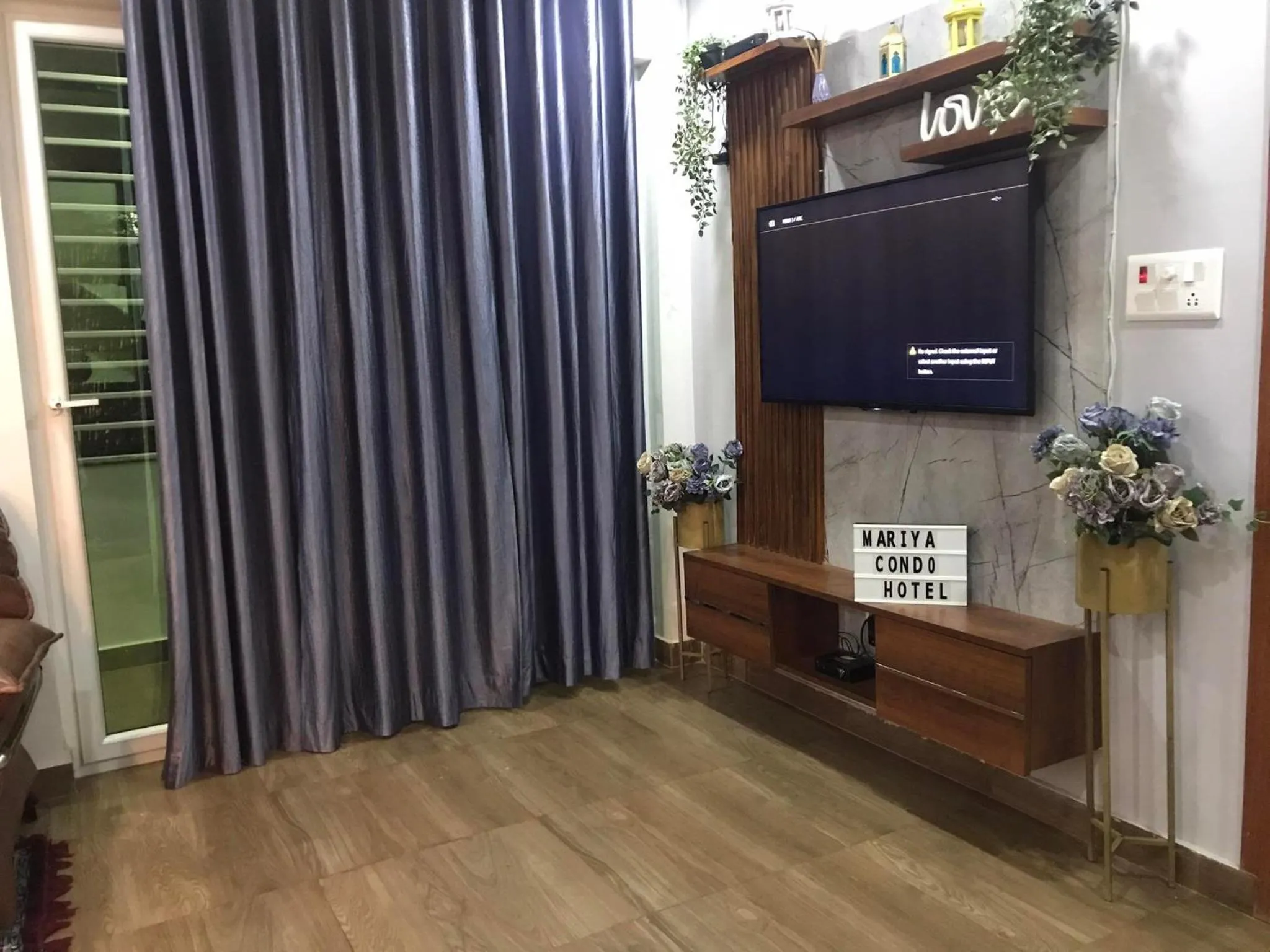 Text overlay in Mariya Condo hotel