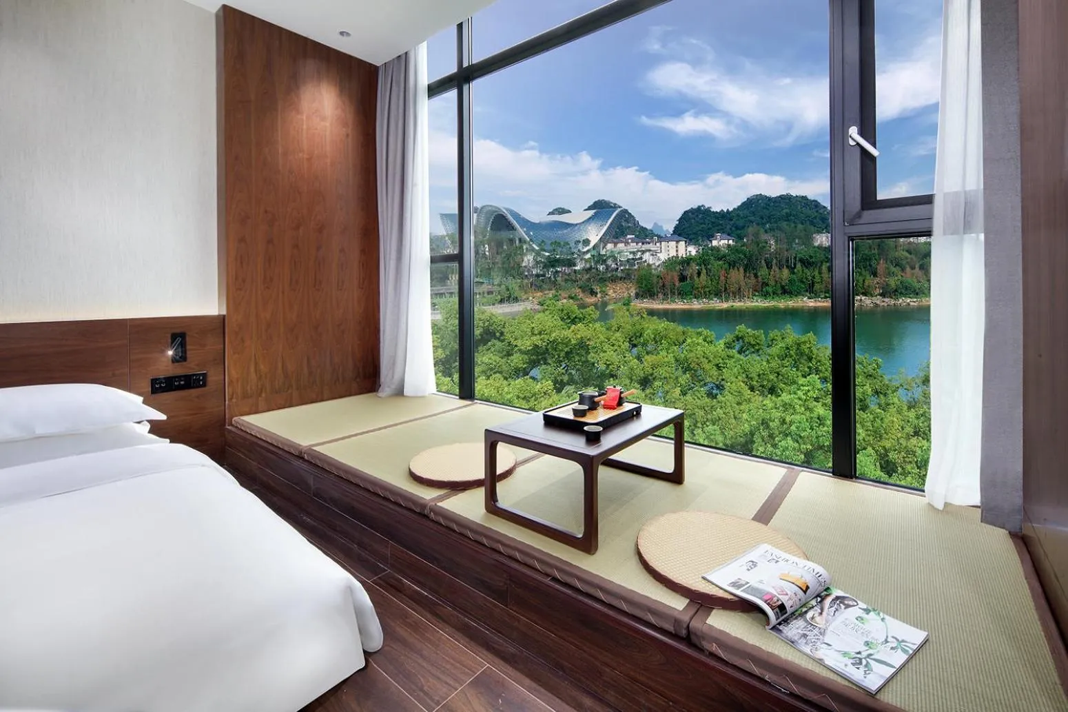 Seating area, Bed in Riverside Wing Hotel Guilin
