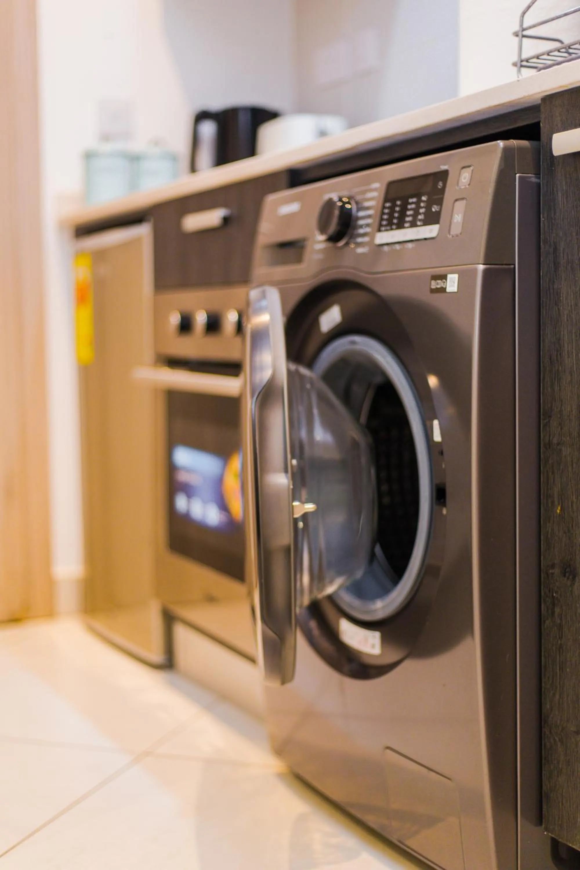 washing machine in Accra Luxury Apartments @ The Lennox