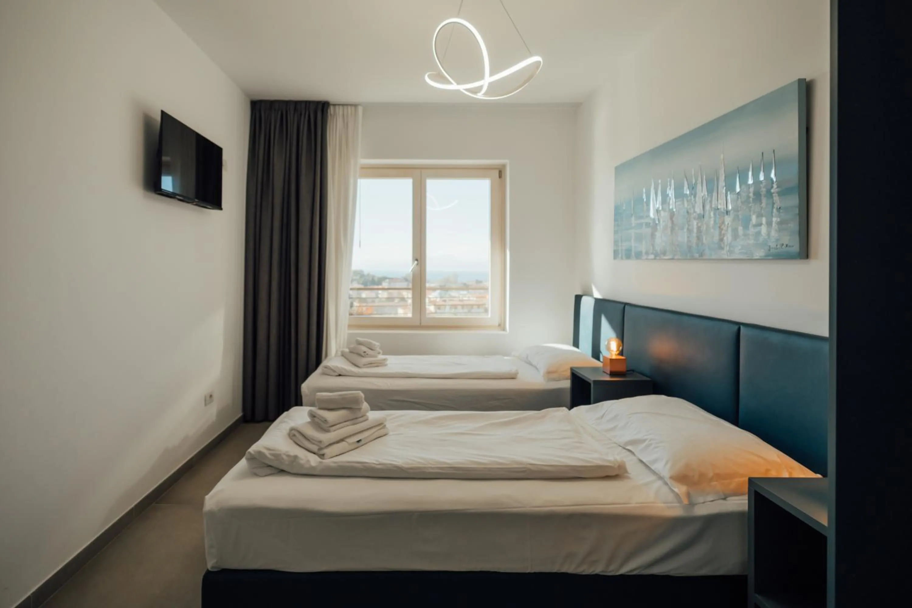 Bed in Apartments Monsurei, Lake view