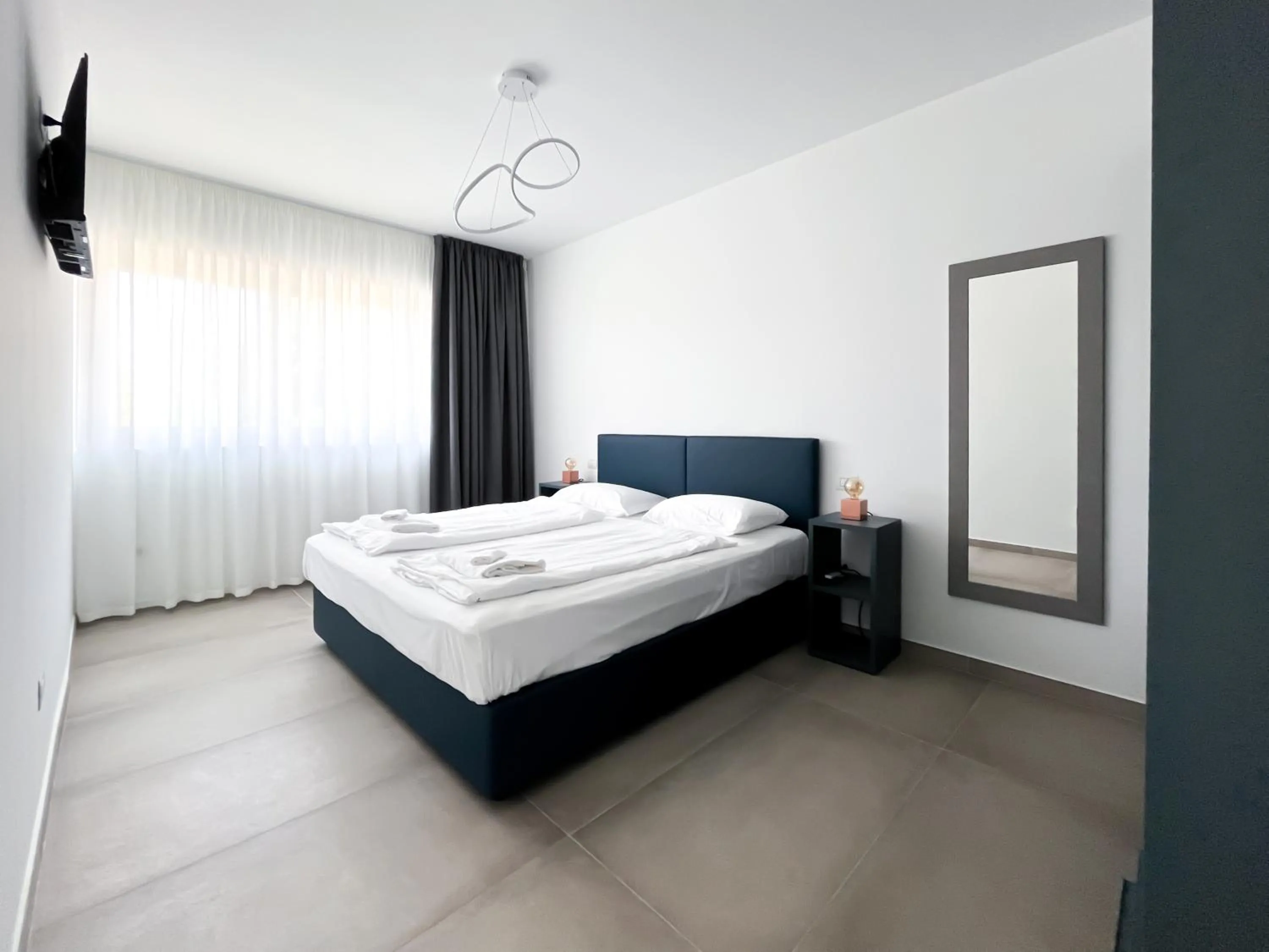 Bed in Apartments Monsurei, Lake view