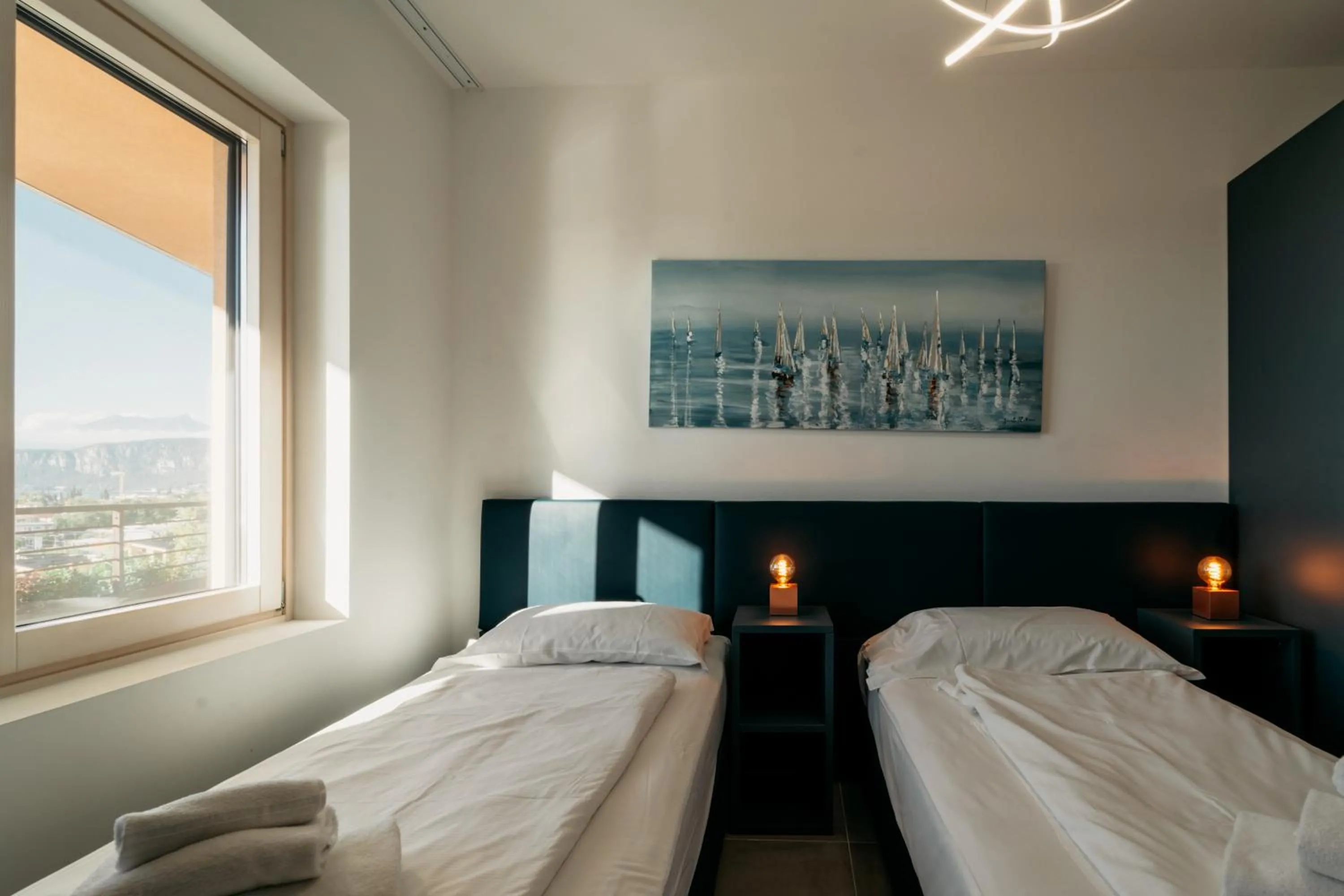 Bed in Apartments Monsurei, Lake view