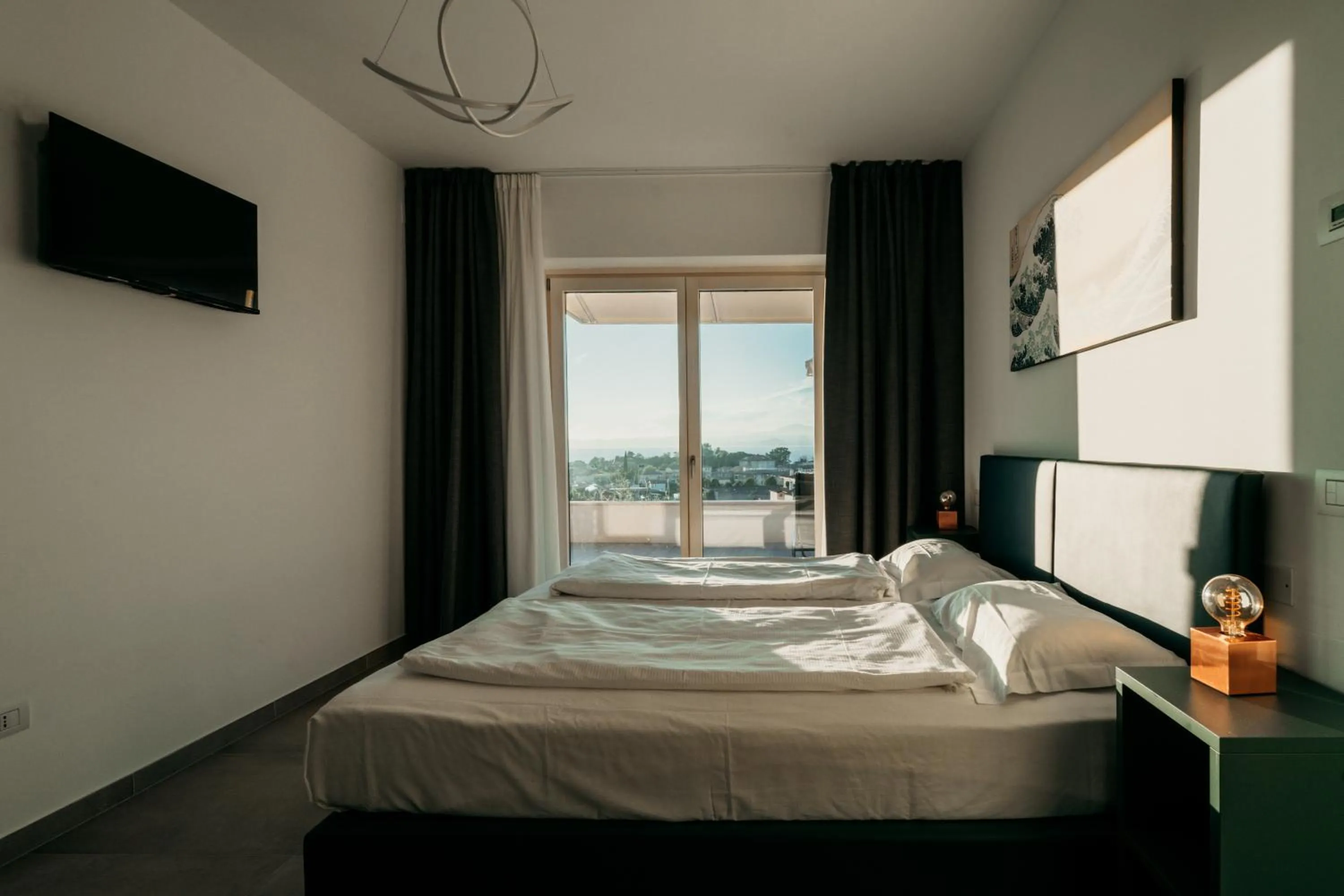Bed in Apartments Monsurei, Lake view