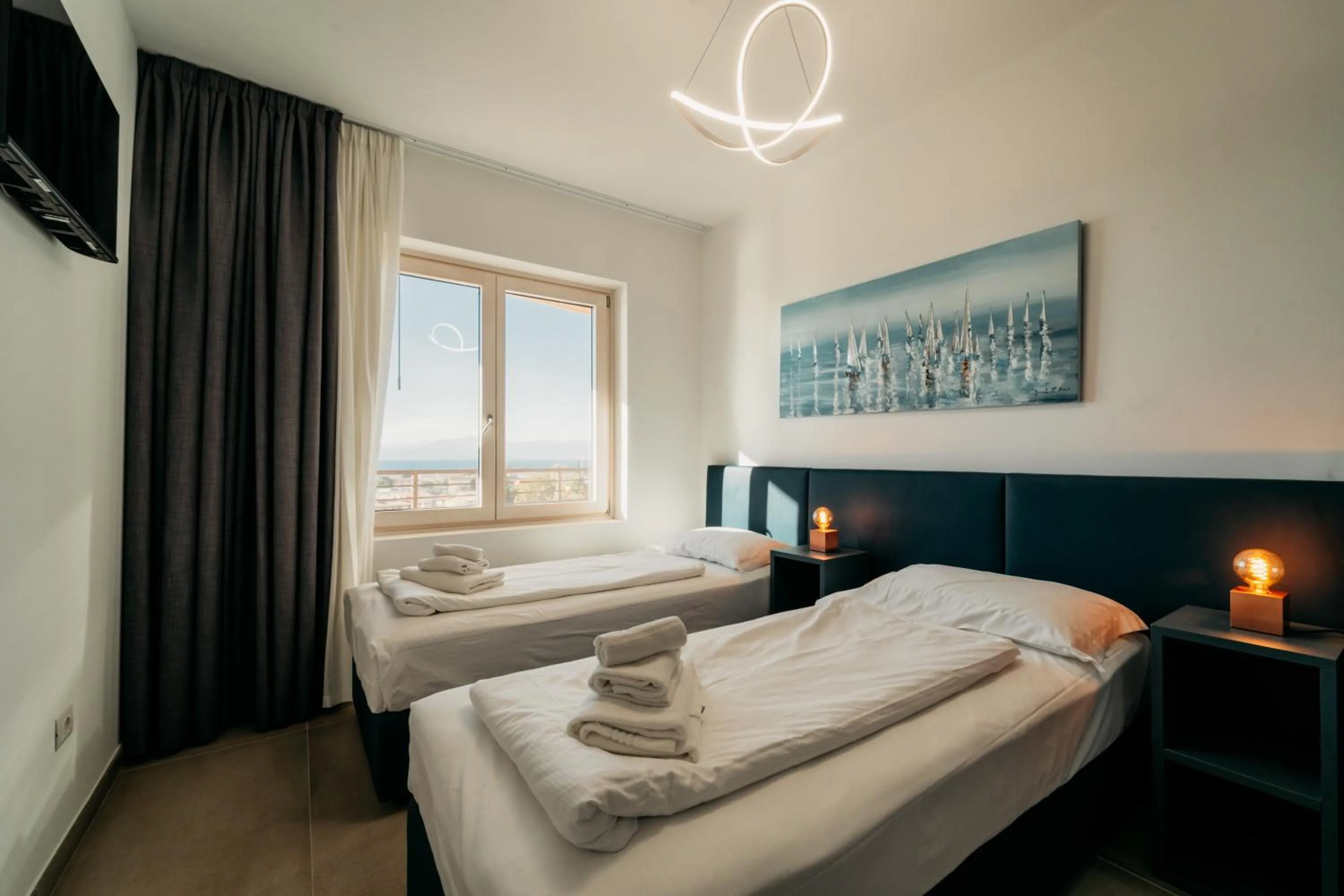 Bed in Apartments Monsurei, Lake view