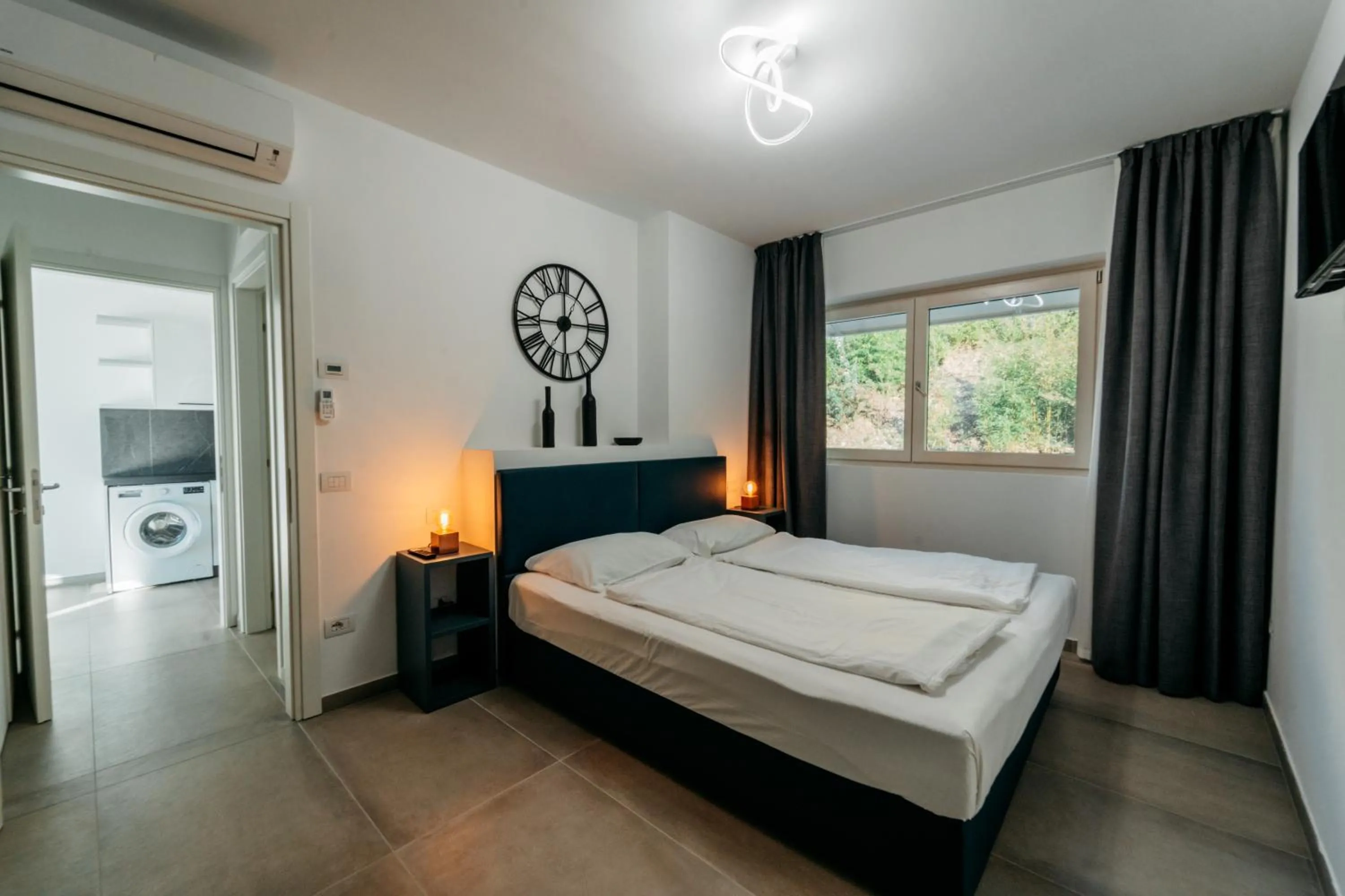 Bed in Apartments Monsurei, Lake view