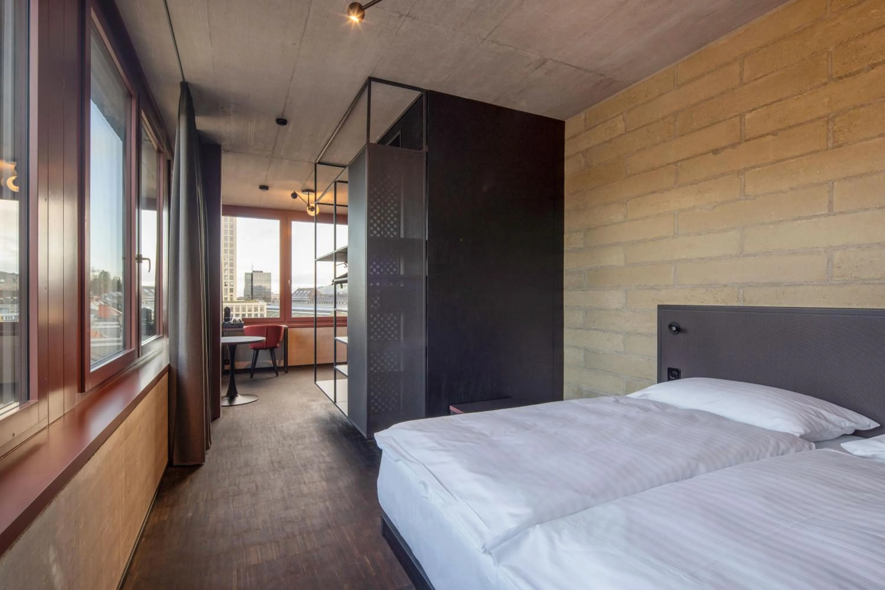 Bedroom, Bed in Tailormade Hotel LEO St Gallen