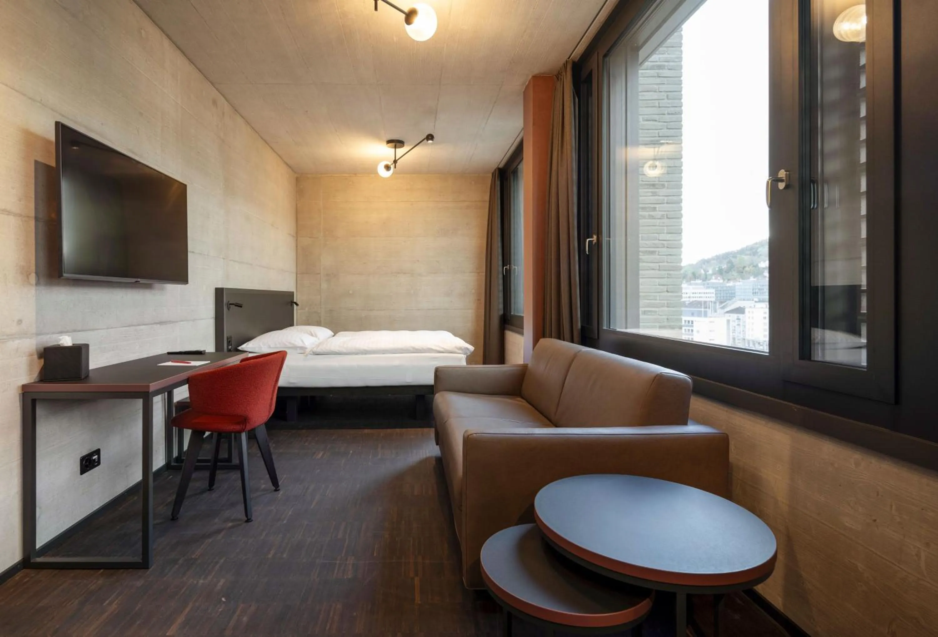 Bedroom, Bed in Tailormade Hotel LEO St Gallen