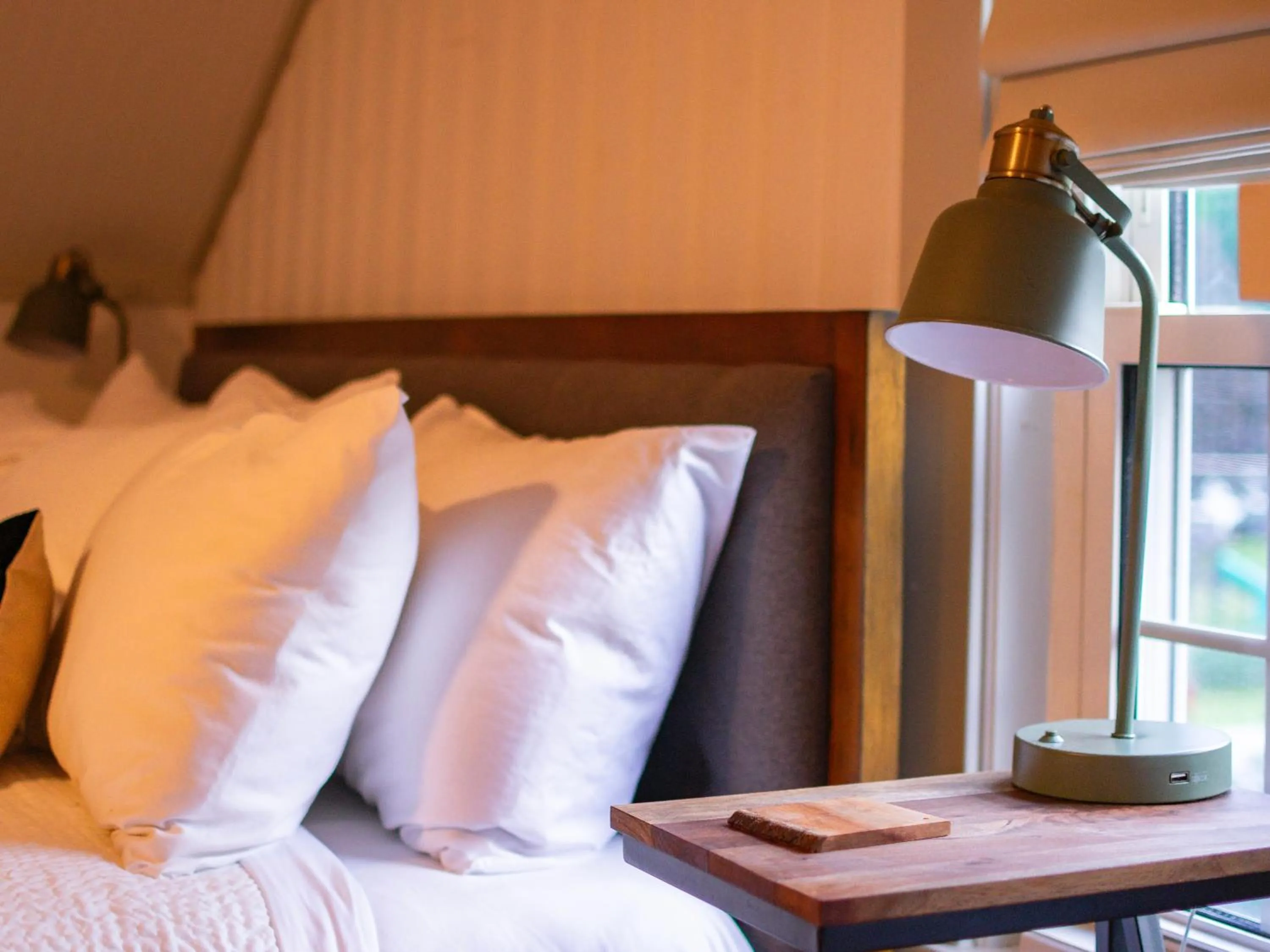 Bed in Launchpoint Lodge