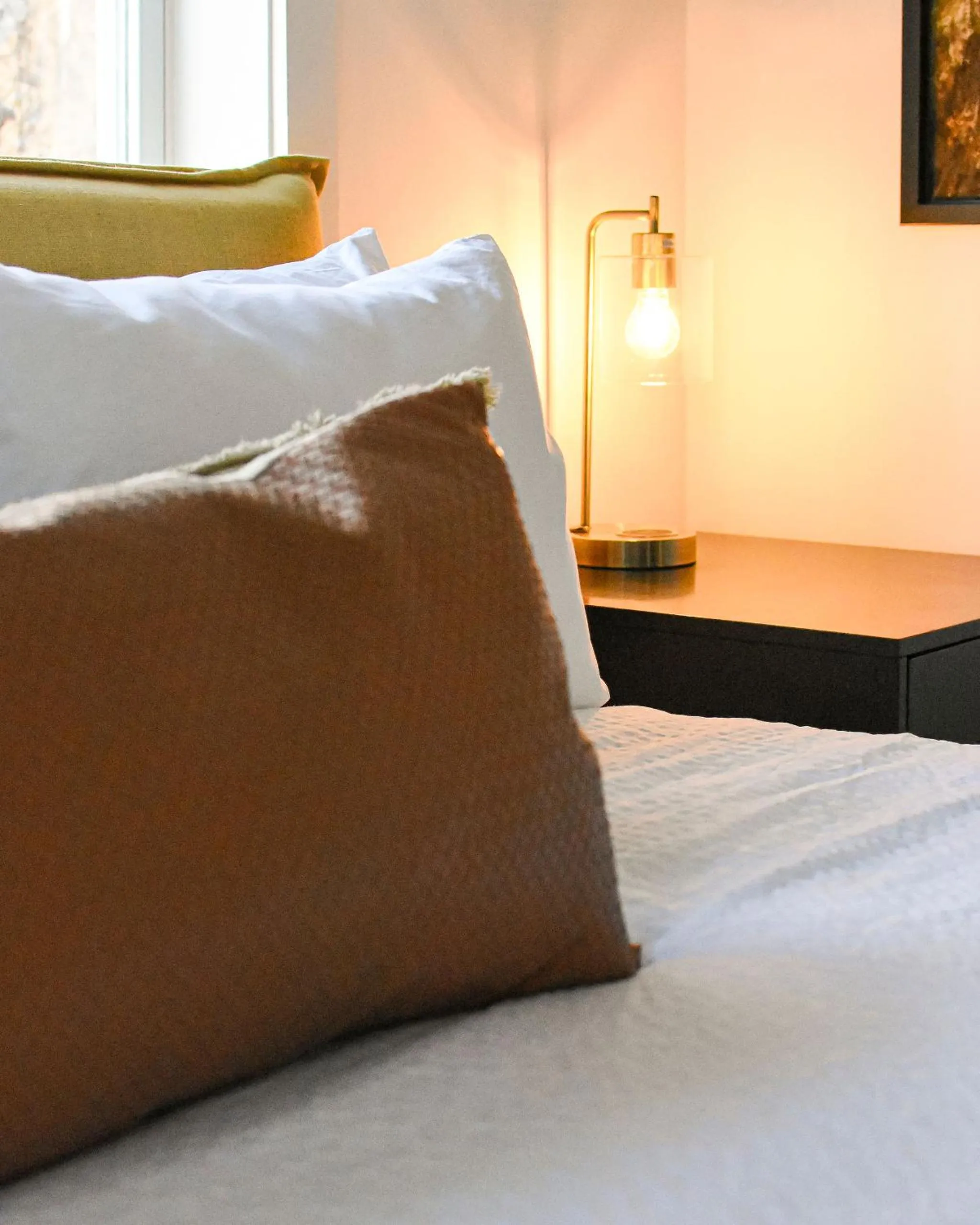 Bed in Launchpoint Lodge