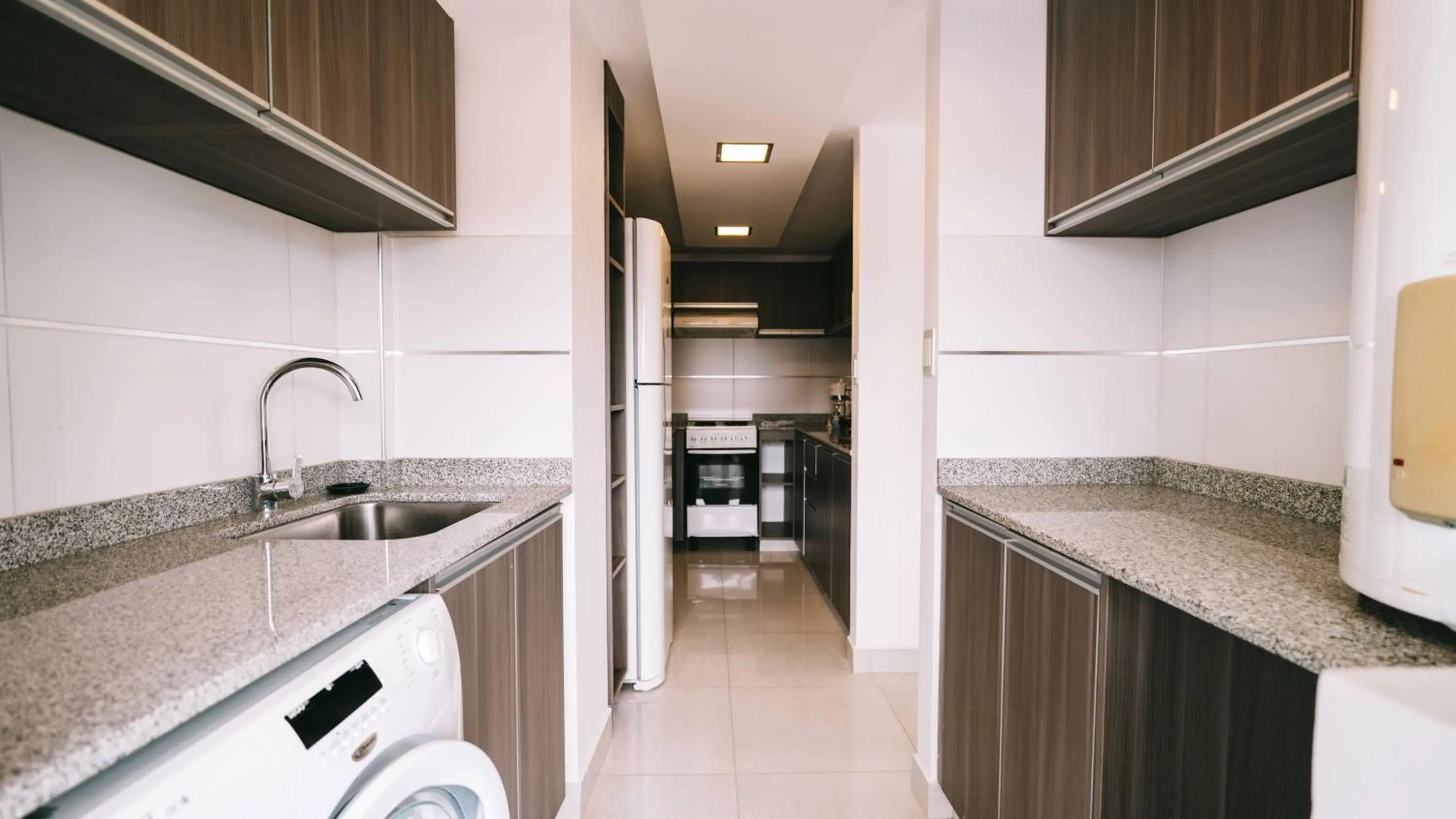 Kitchen or kitchenette in HOMEFULL Apartamentos