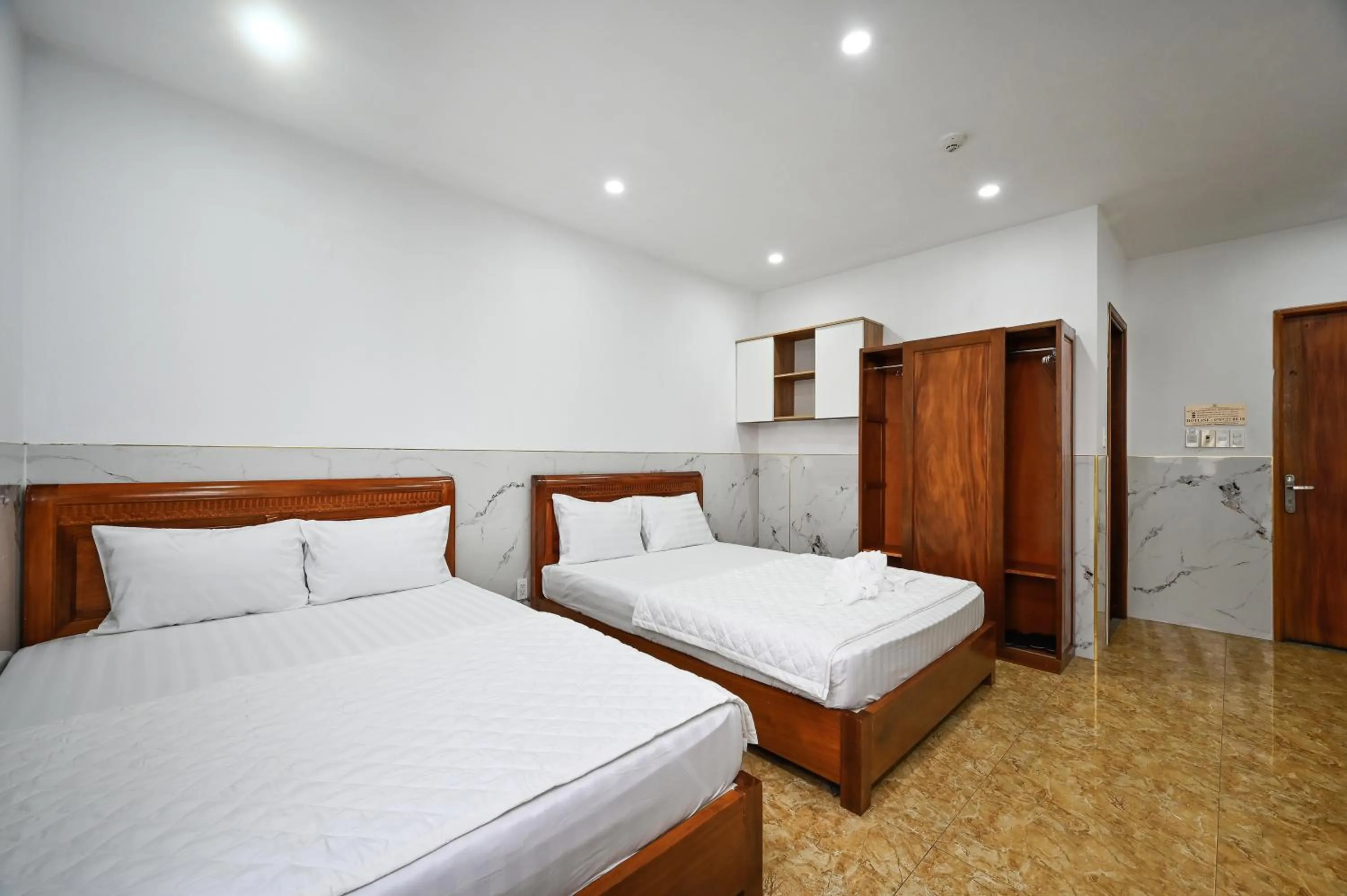 Bed in Yoyo Airport Saigon Hotel