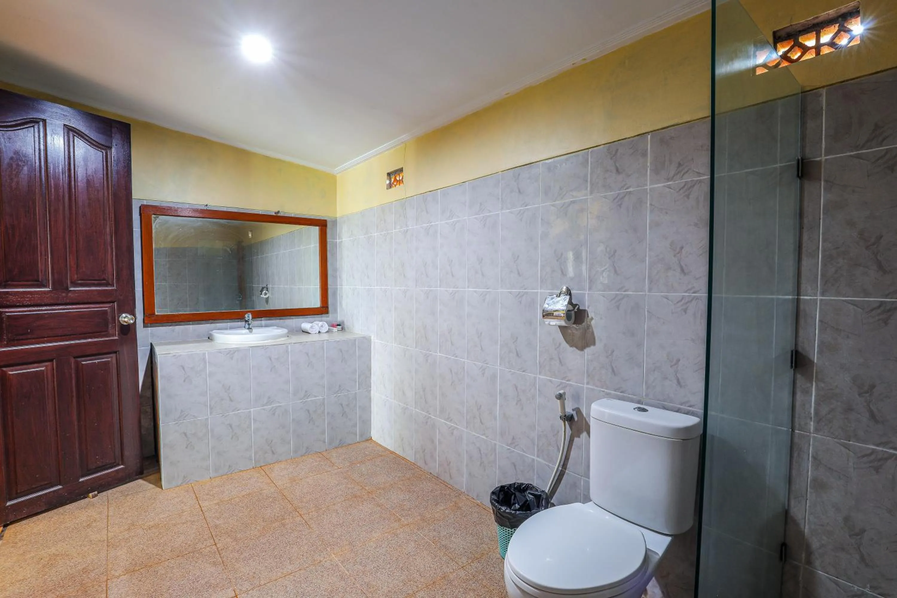 Toilet in Grand Ball Beach Garden