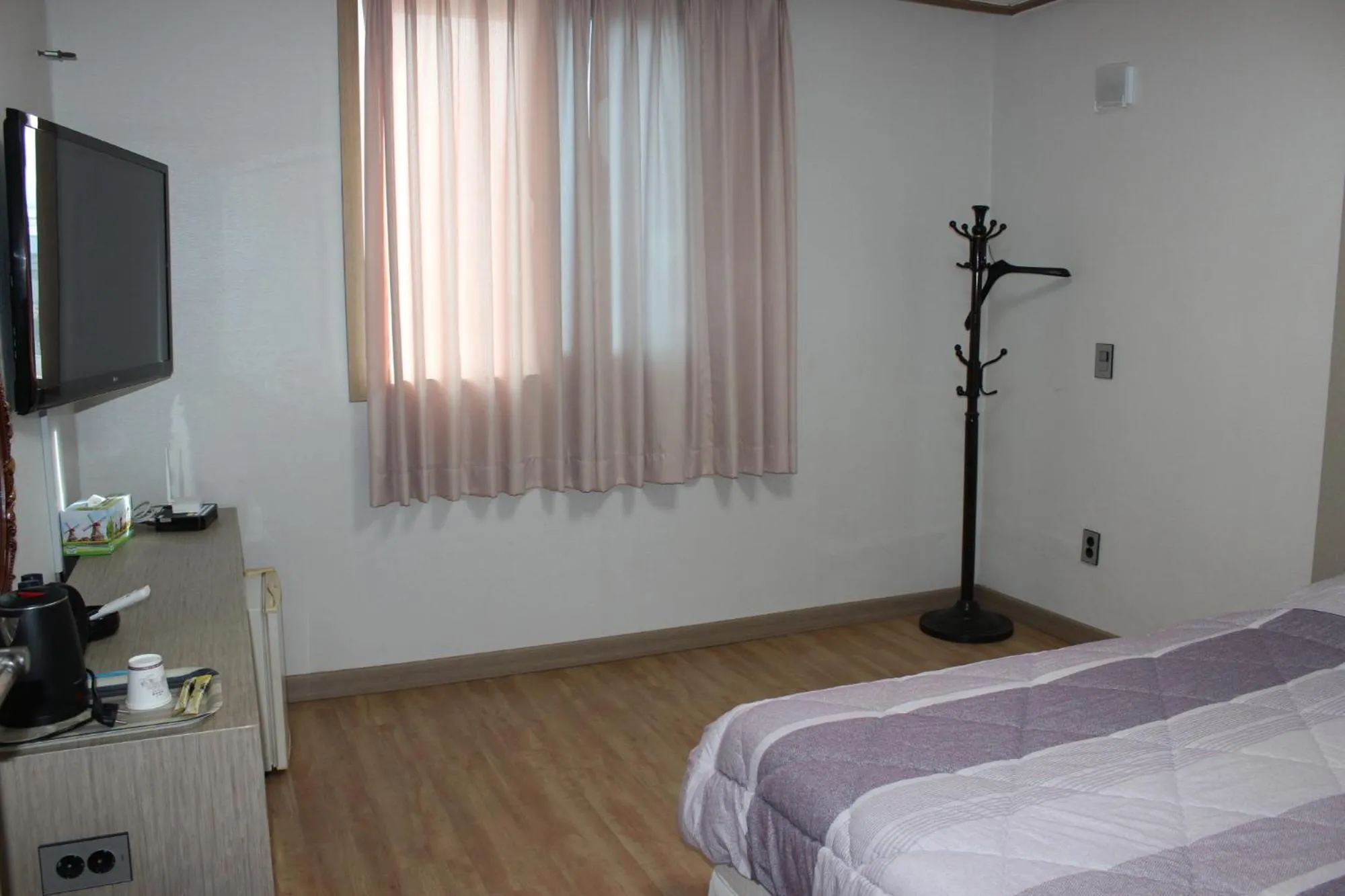 Bed in Gipoong Hotel