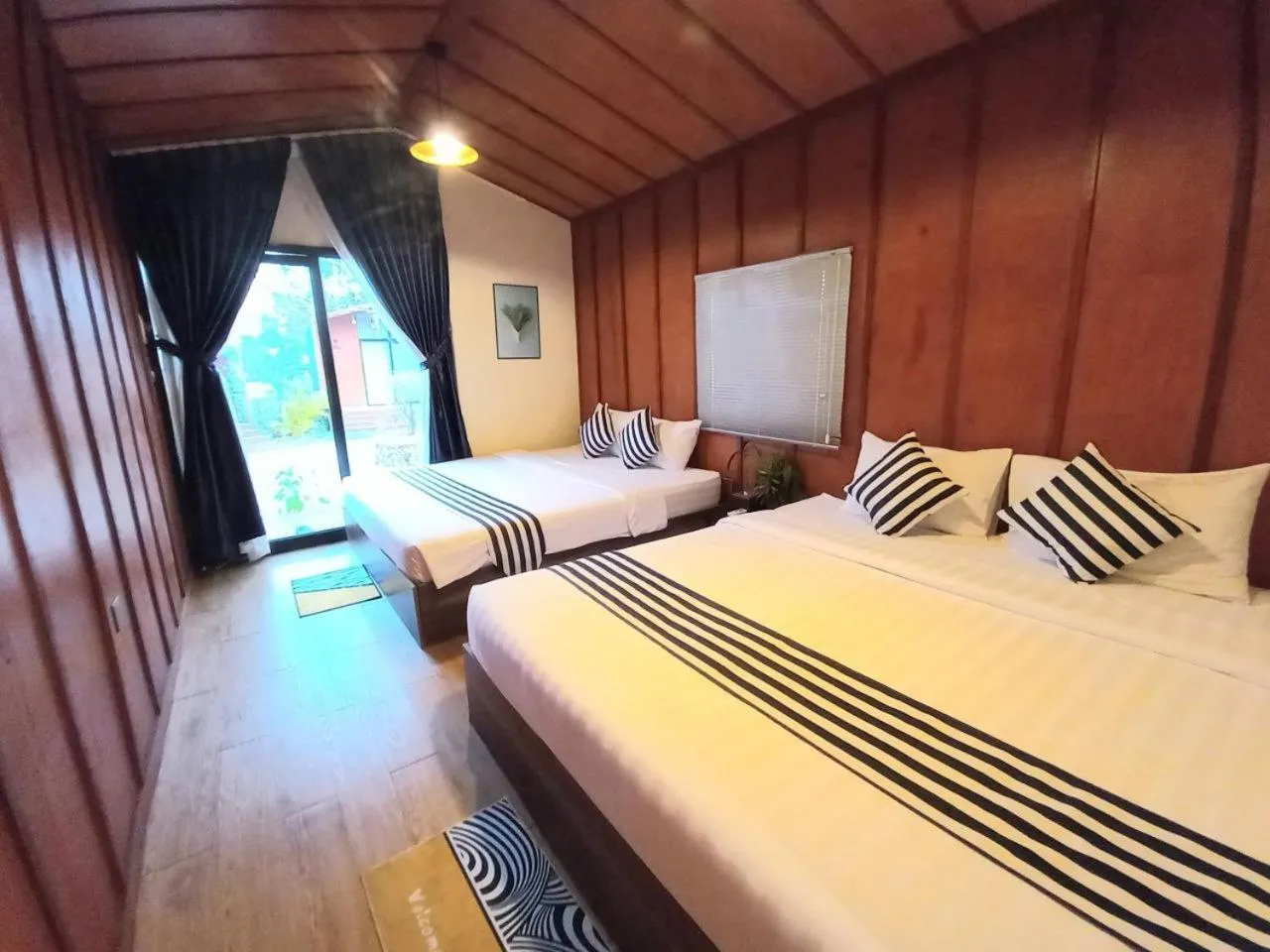 Bed in Kampot Tropical Village