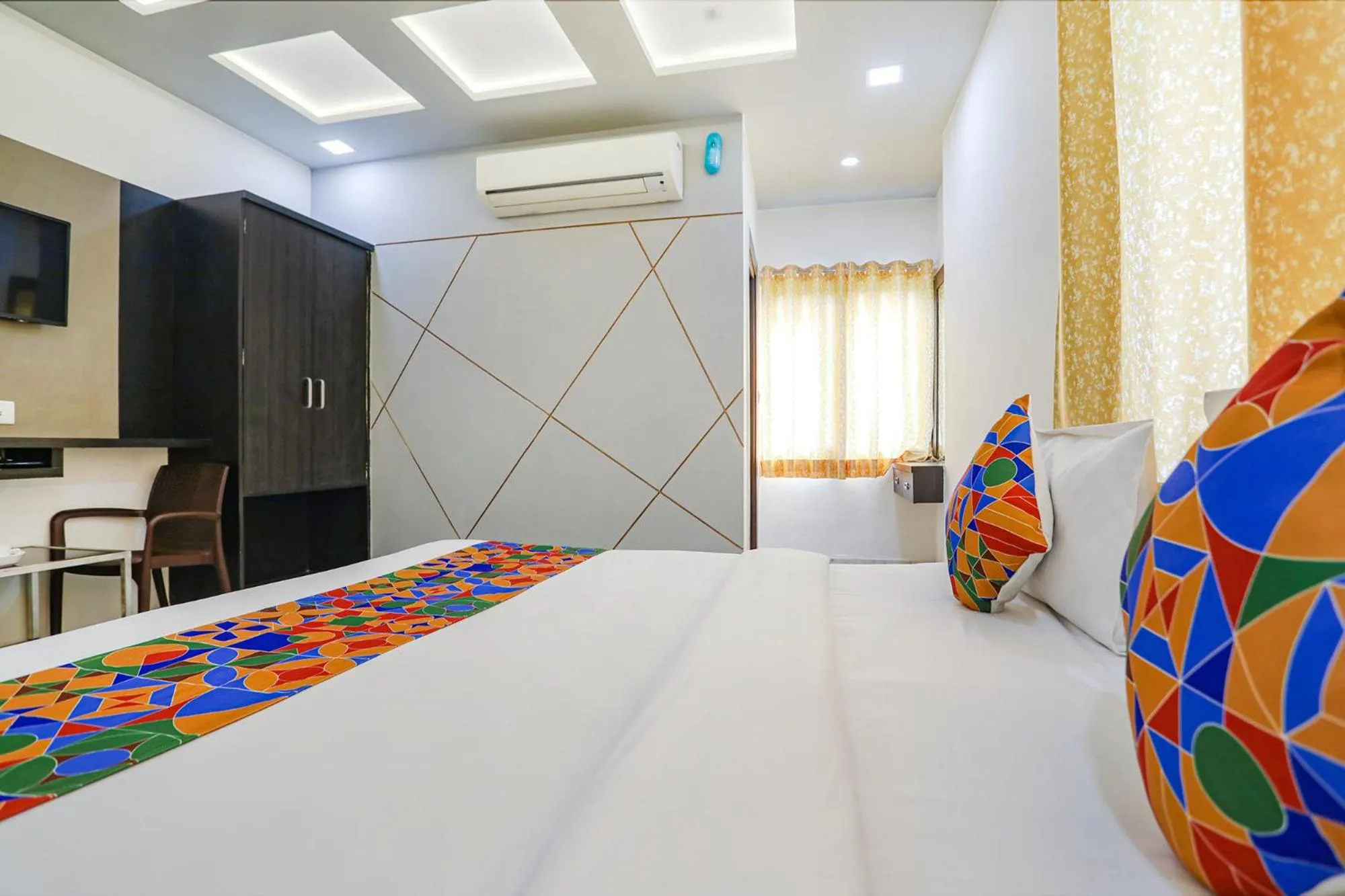 Bed in FabHotel Aaradhya Residency