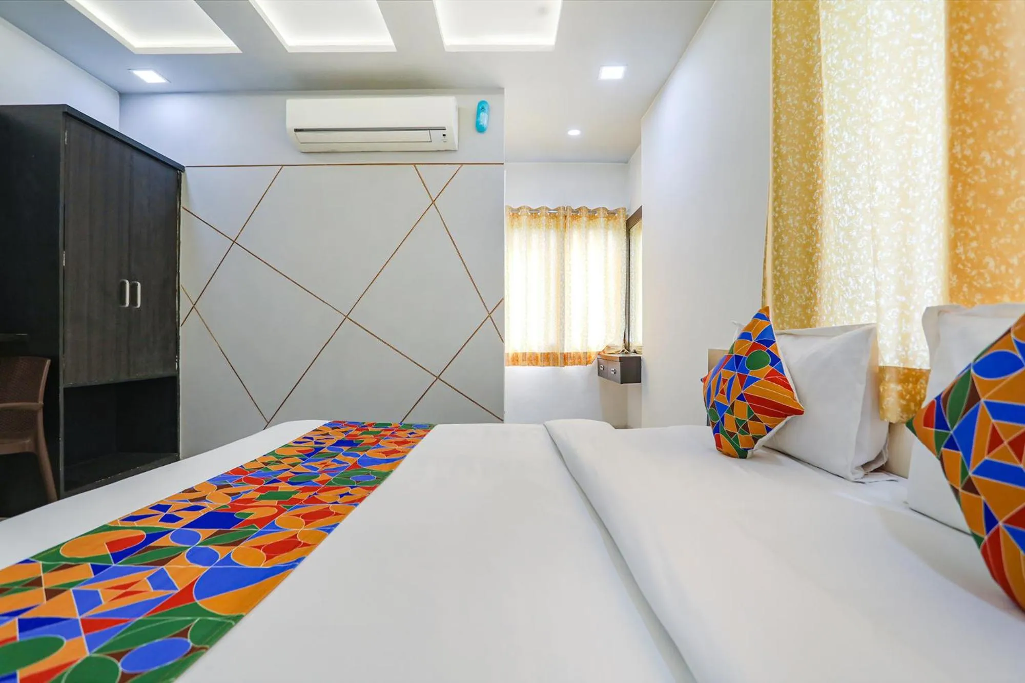 Bed in FabHotel Aaradhya Residency