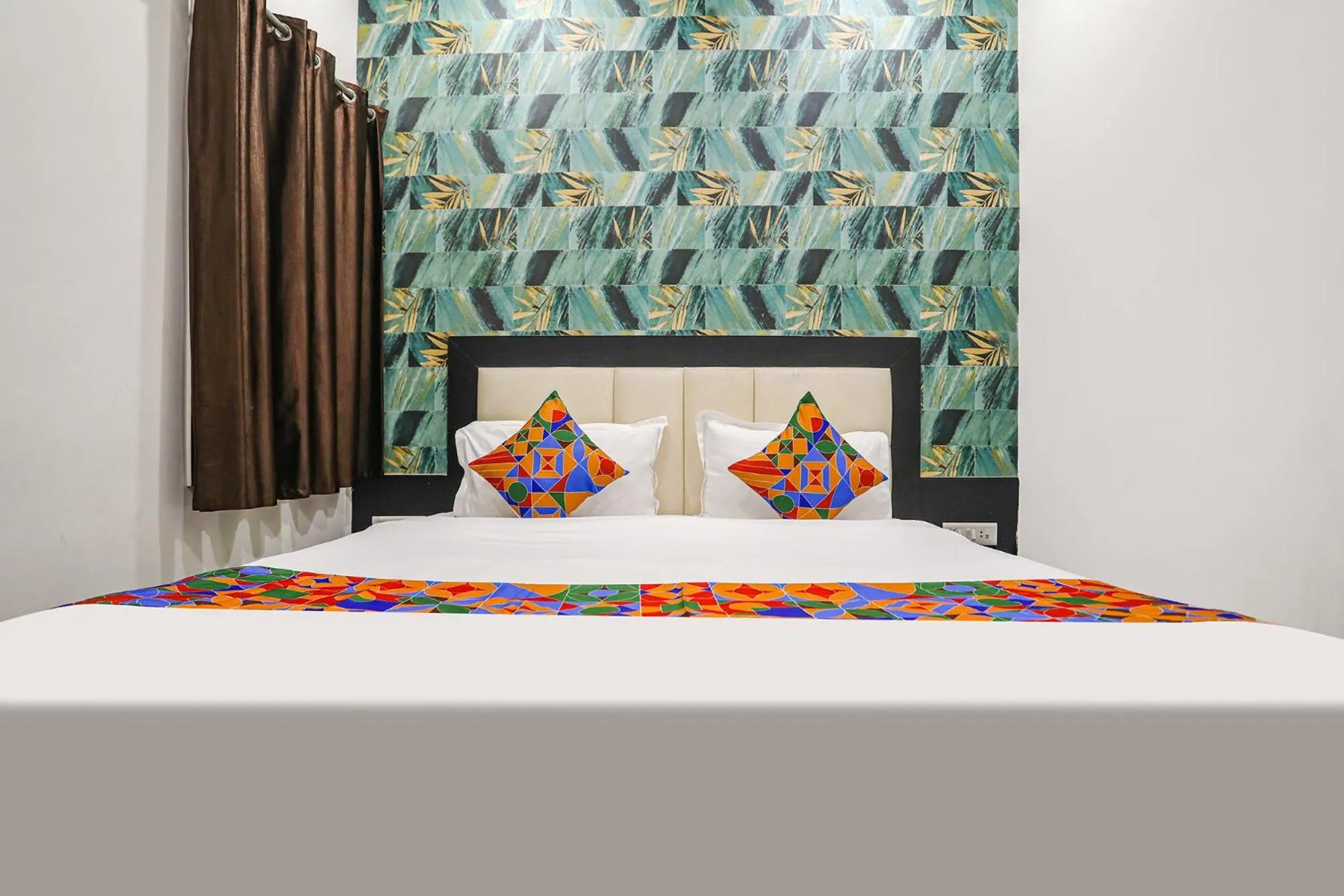 Bed in FabHotel Aaradhya Residency