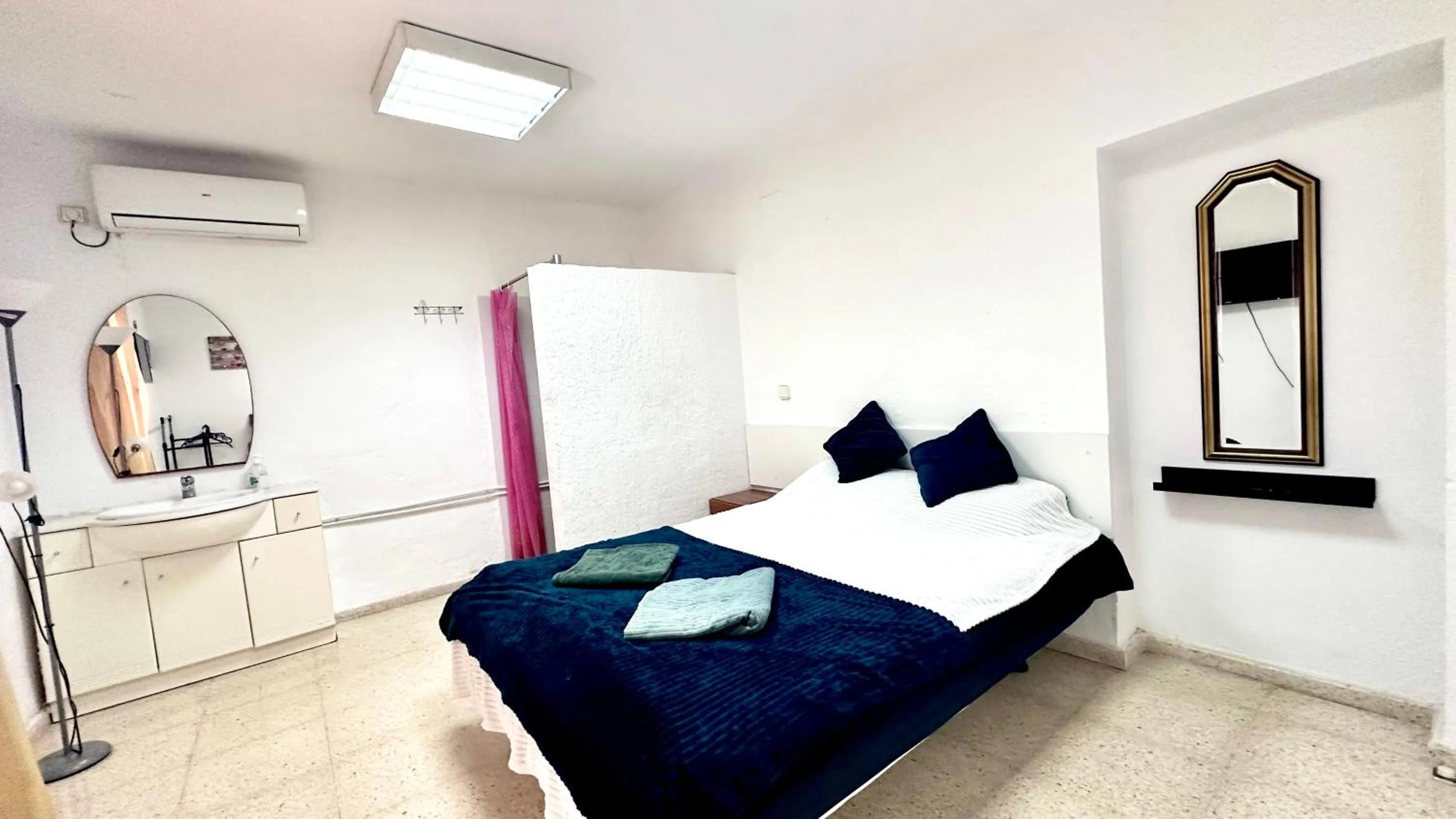 Bed in Las habitaciones en Alicante