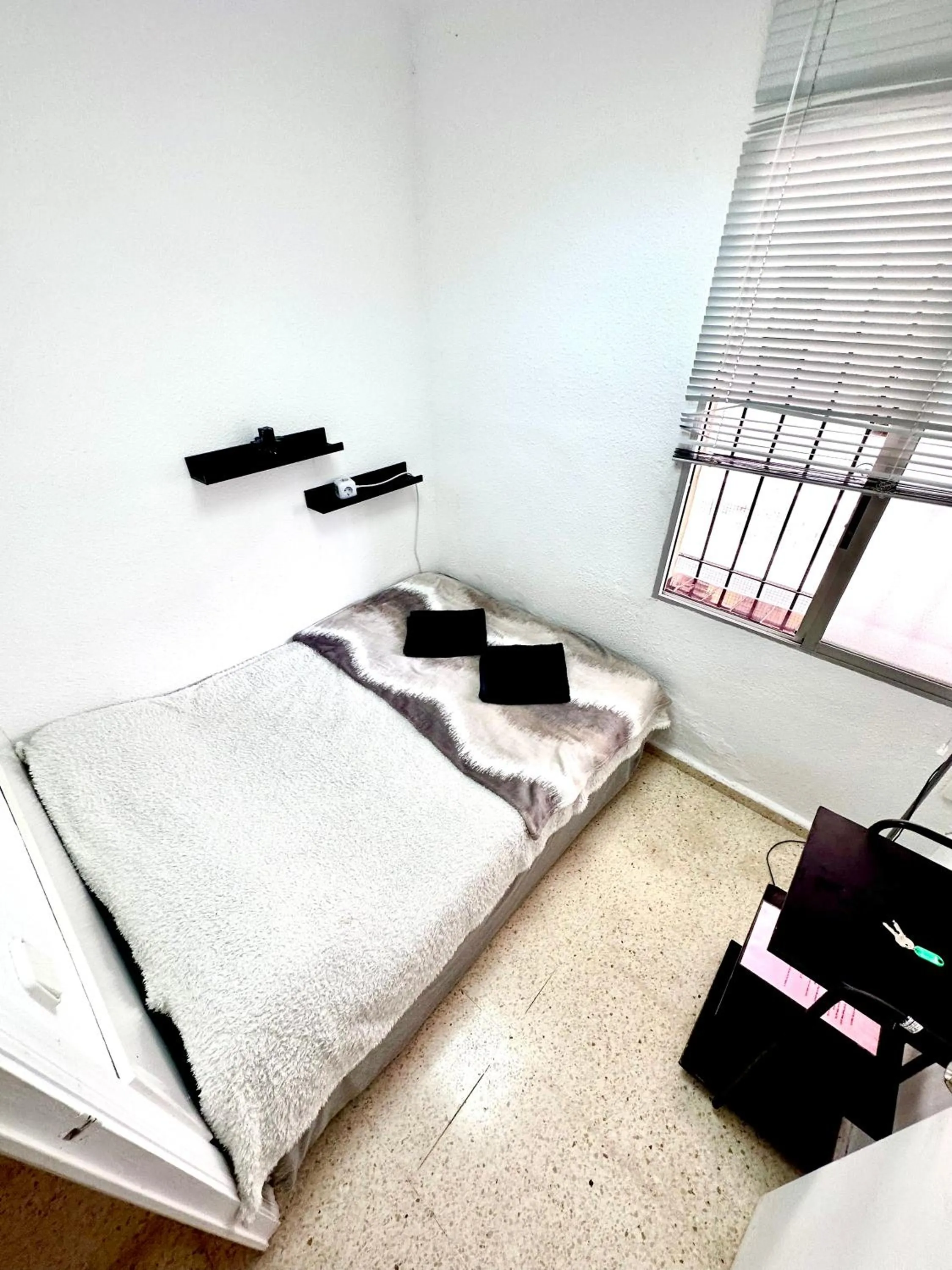 Bed in Las habitaciones en Alicante