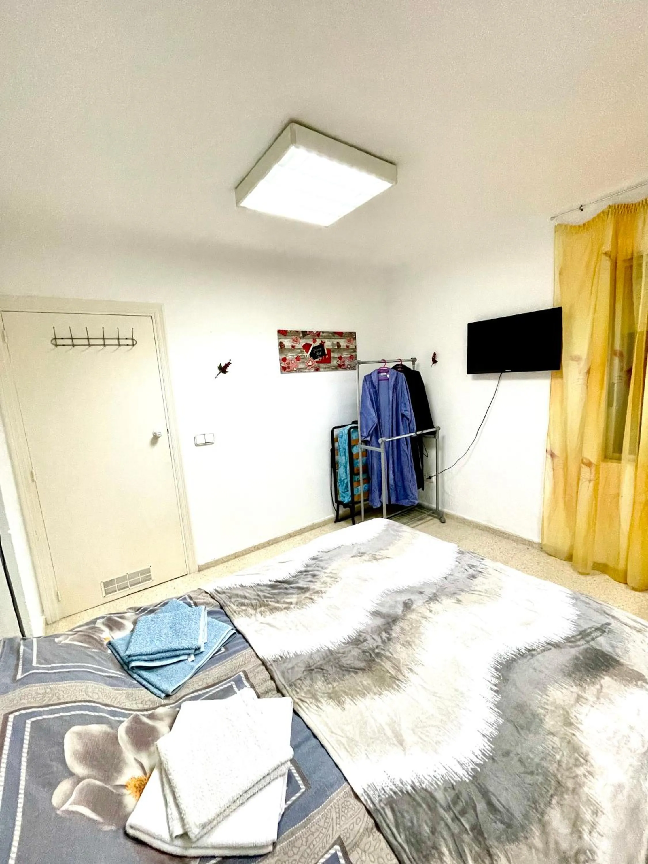 Bed in Las habitaciones en Alicante