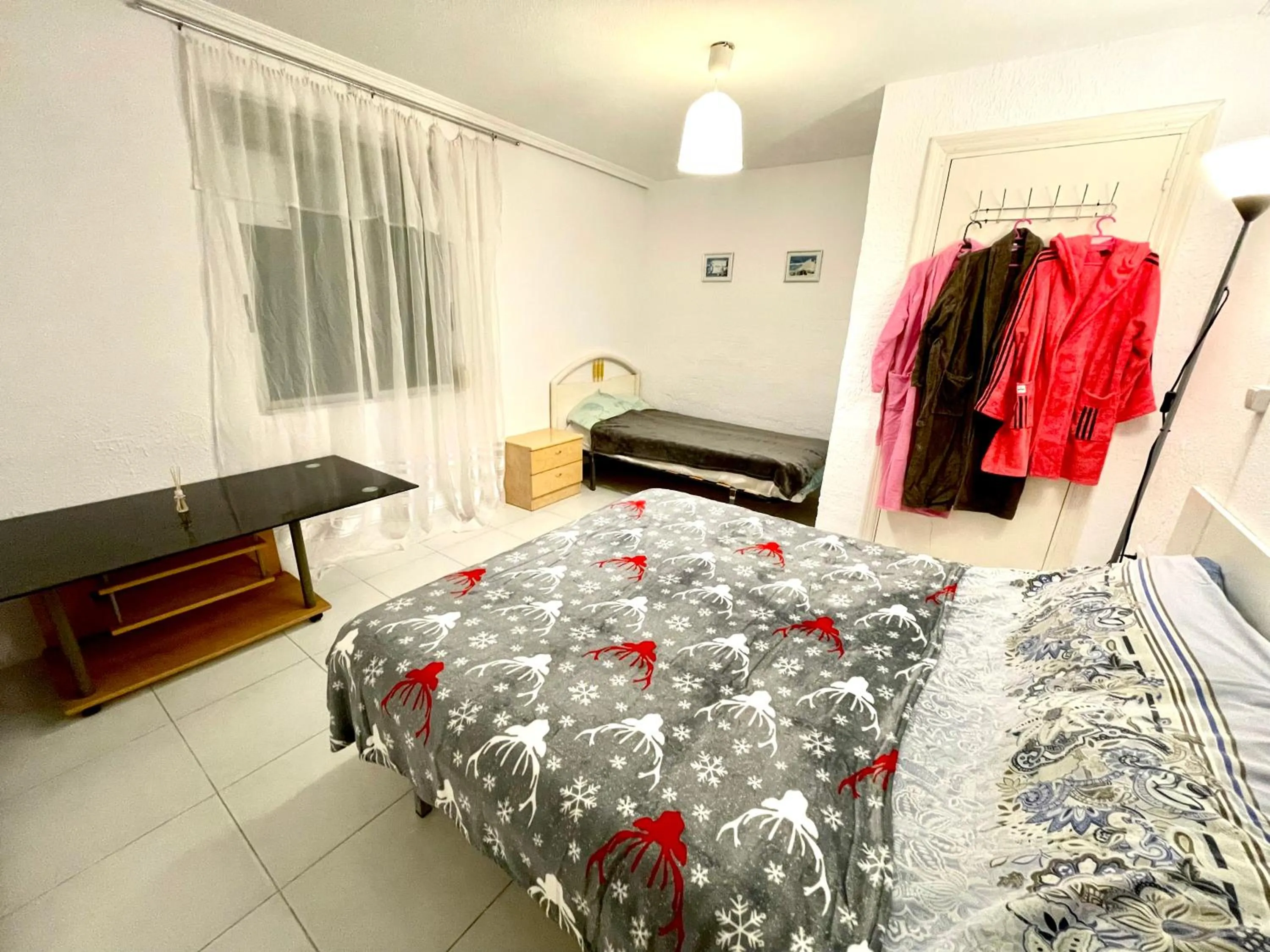 Bed in Las habitaciones en Alicante