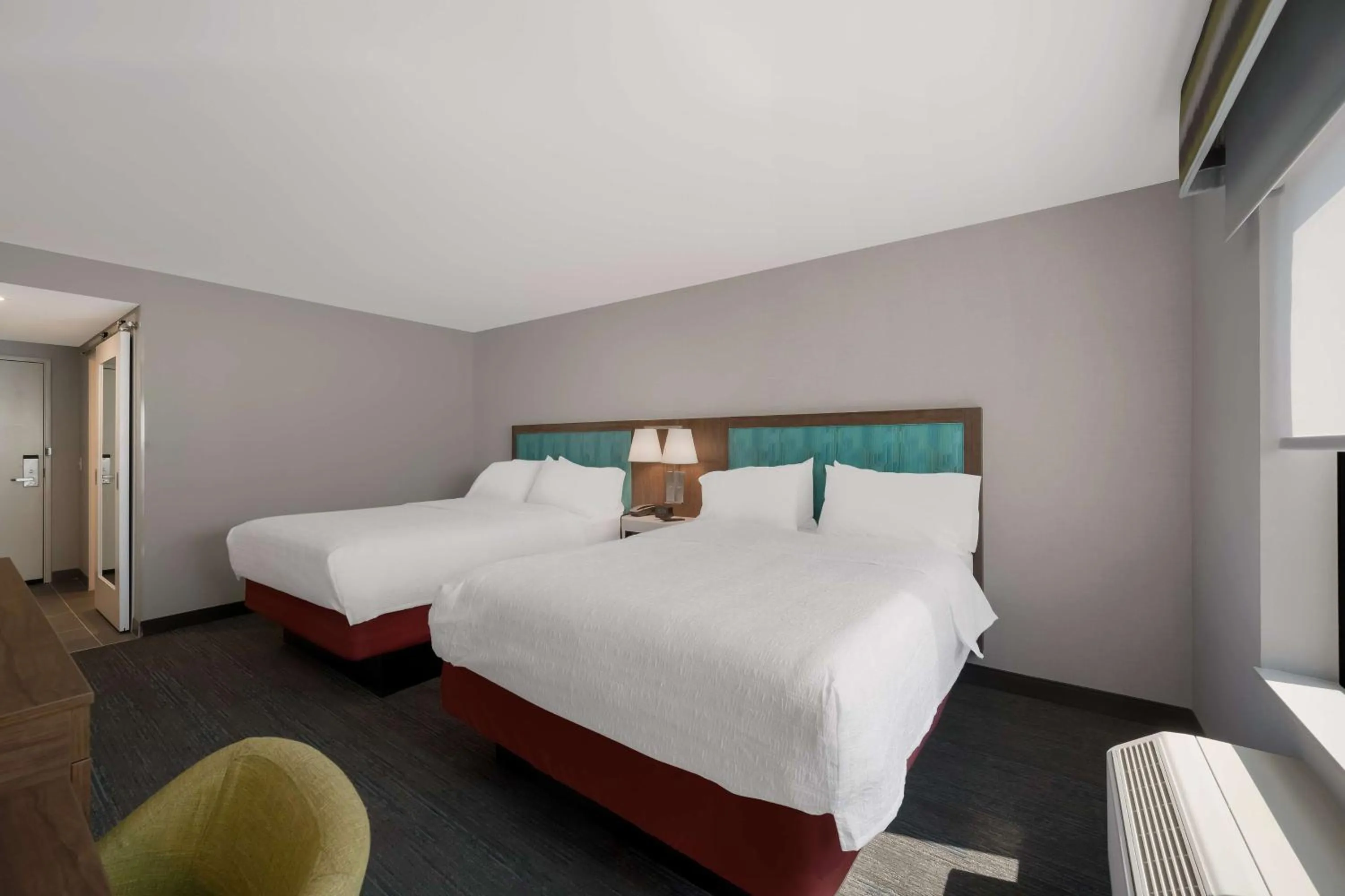Bed in Hampton Inn by Hilton Detroit Southfield