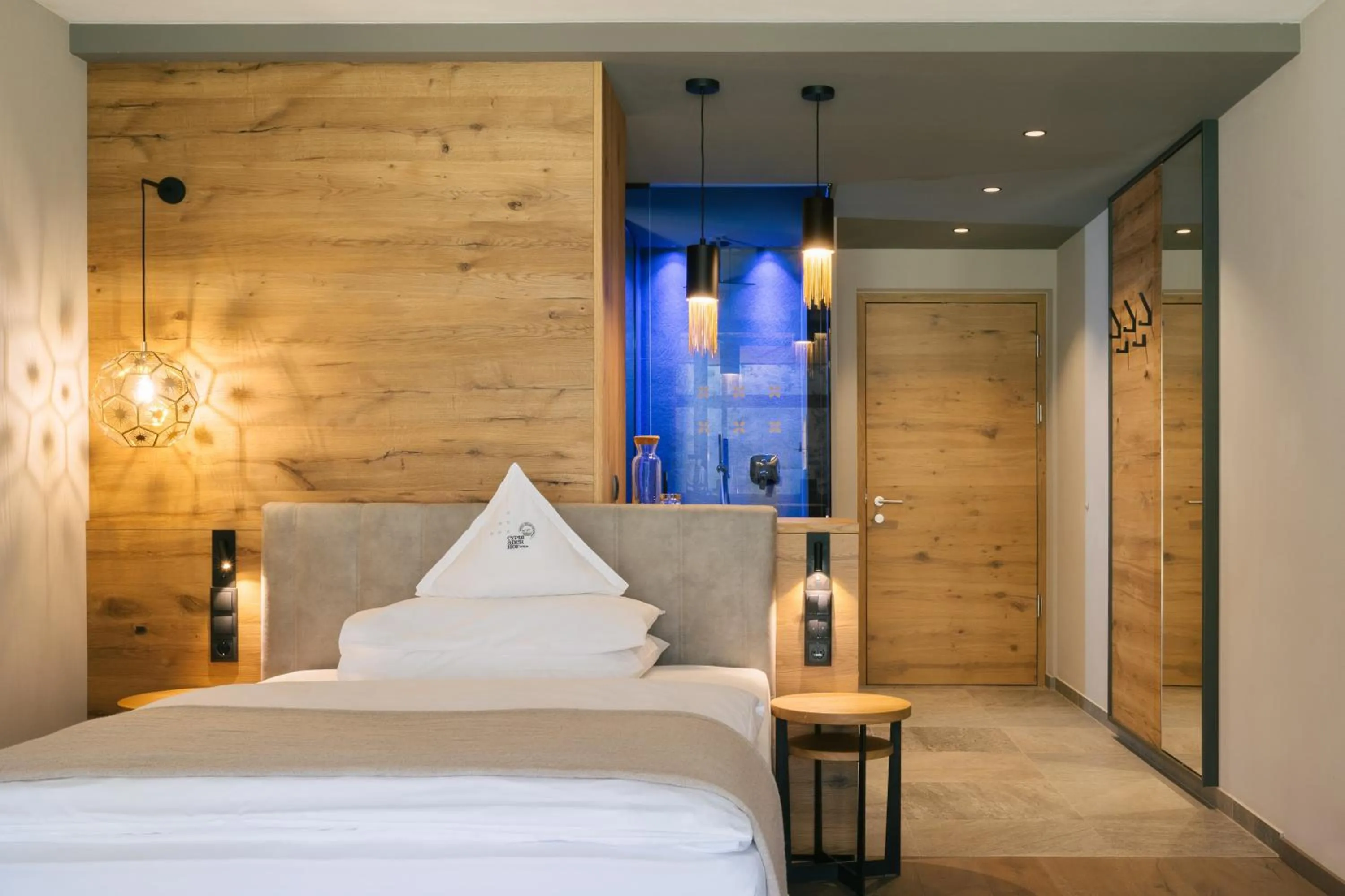 Bed in Cyprianerhof Dolomit Resort