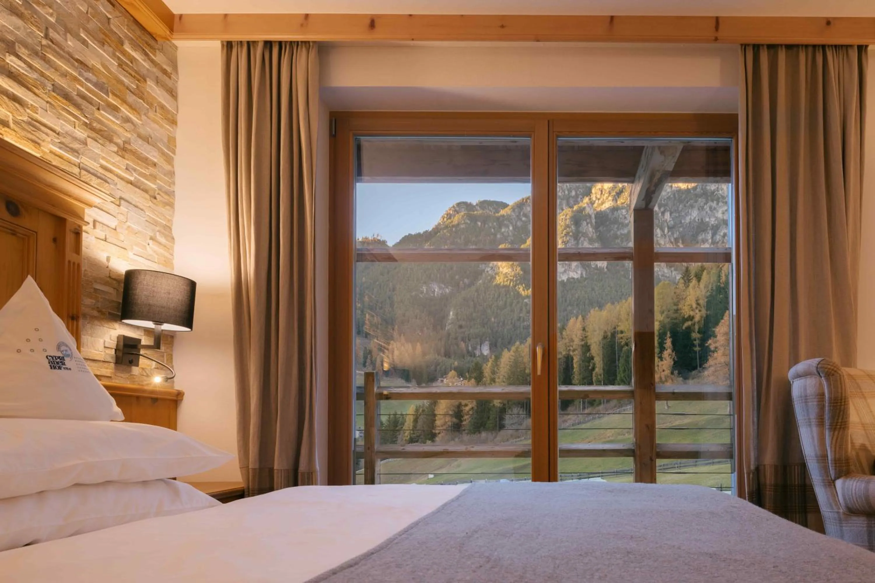 Bed in Cyprianerhof Dolomit Resort