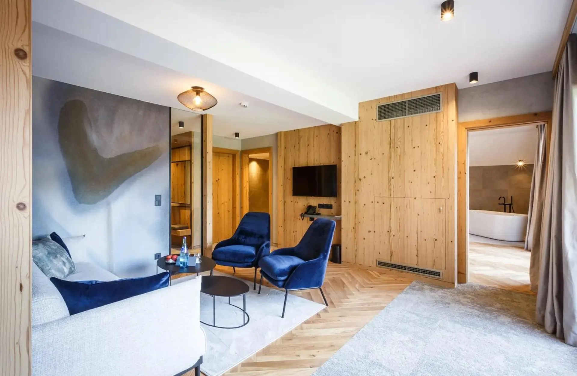 Seating area, Bed in NOVA Moments Boutique Hotel