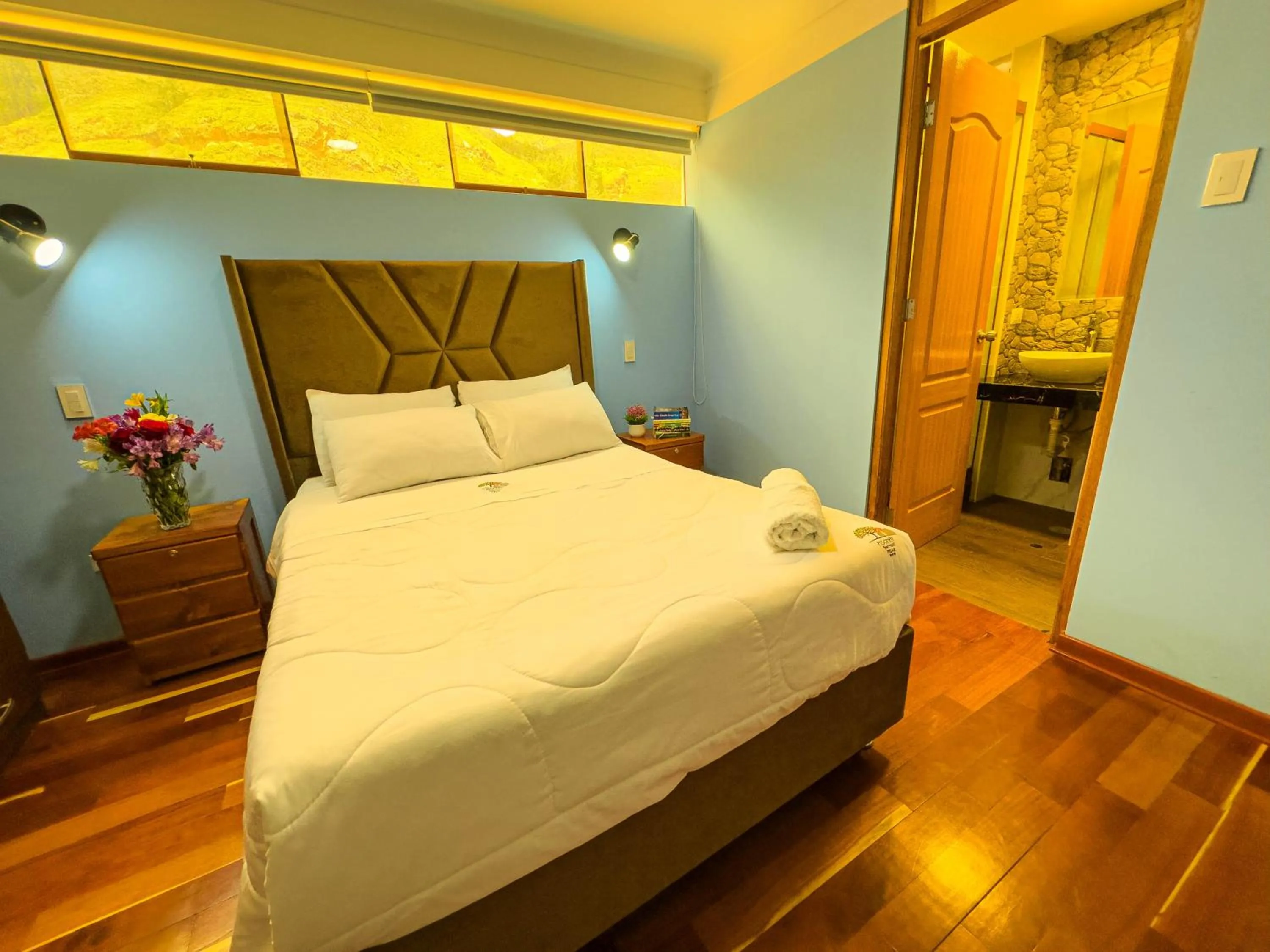 Bed in Pisonay Hotel