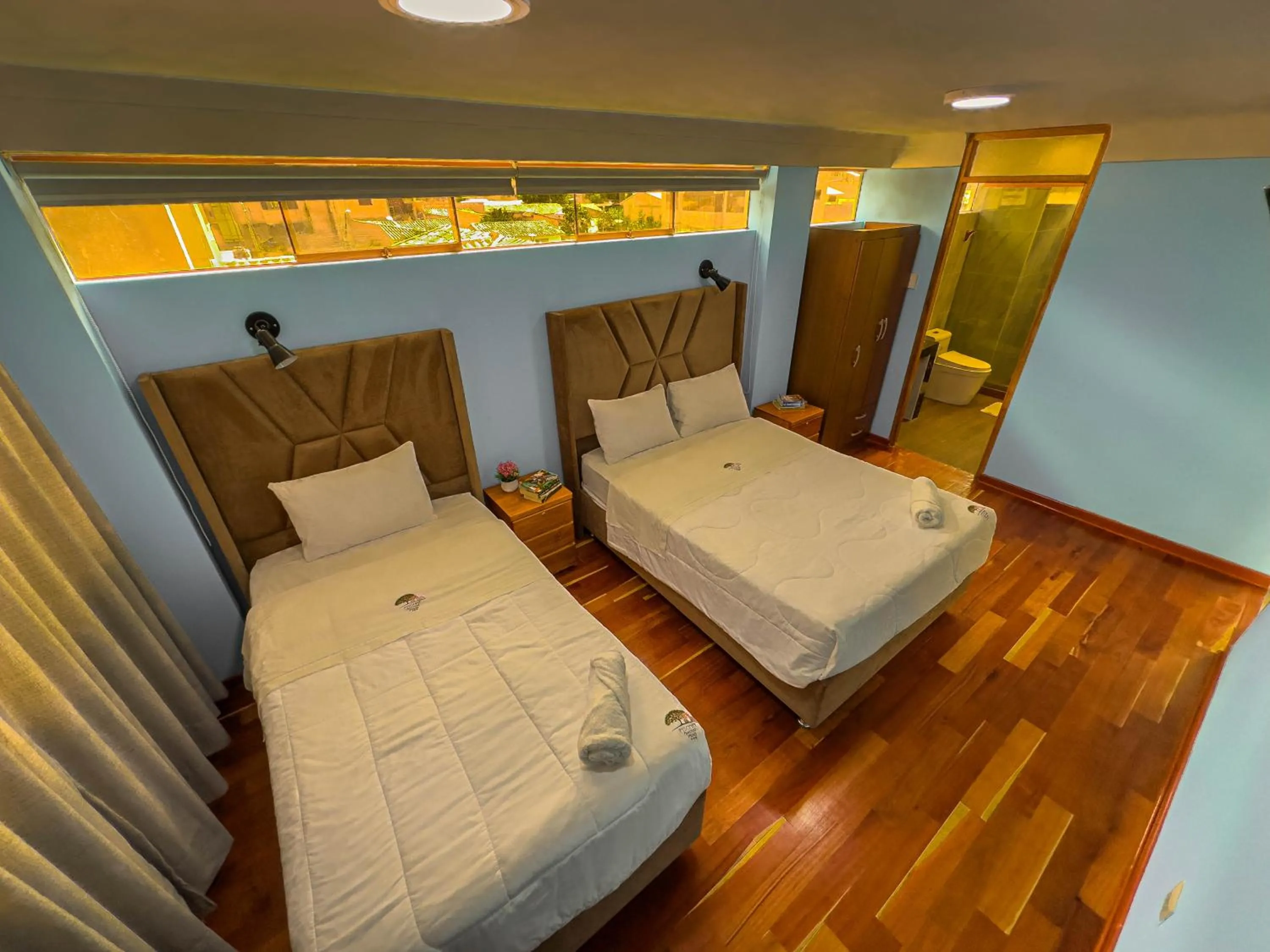 Bed in Pisonay Hotel