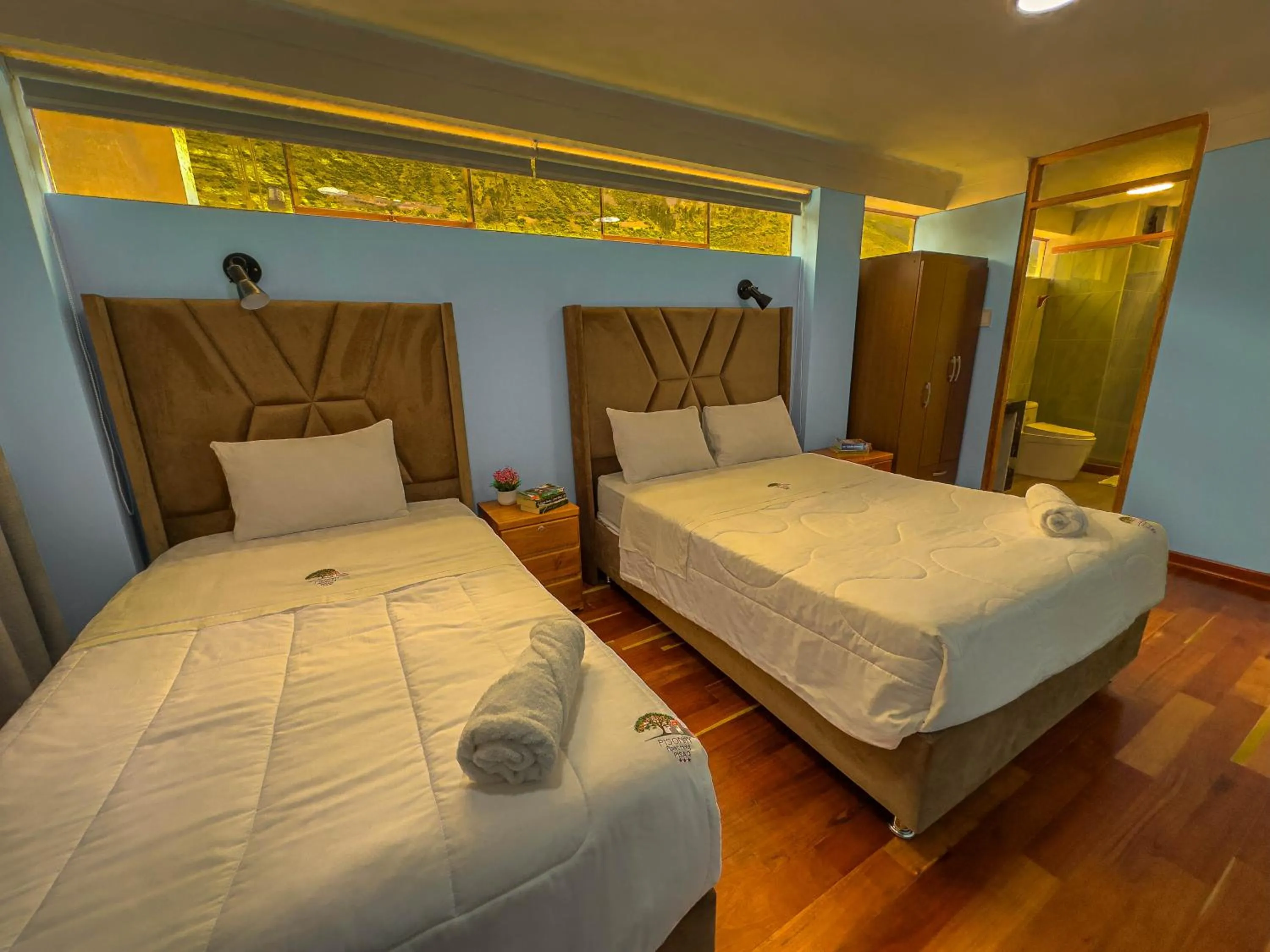 Bed in Pisonay Hotel