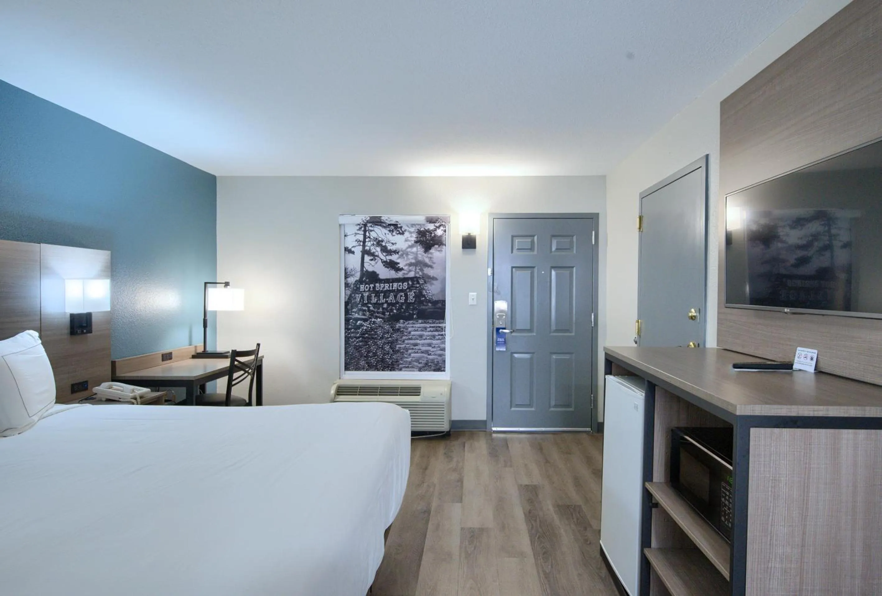 Photo of the whole room, Bed in Hot Springs Village Inn