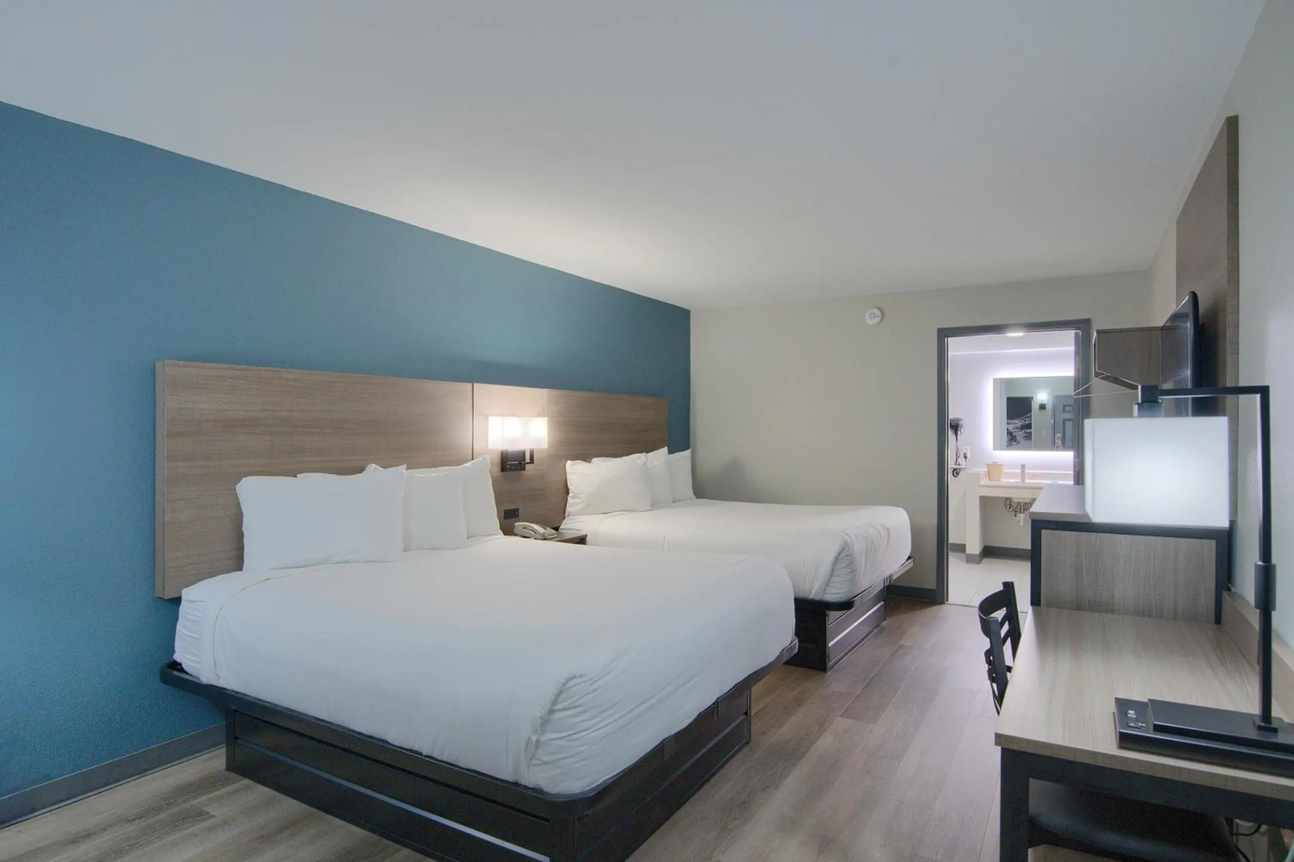 Photo of the whole room, Bed in Hot Springs Village Inn