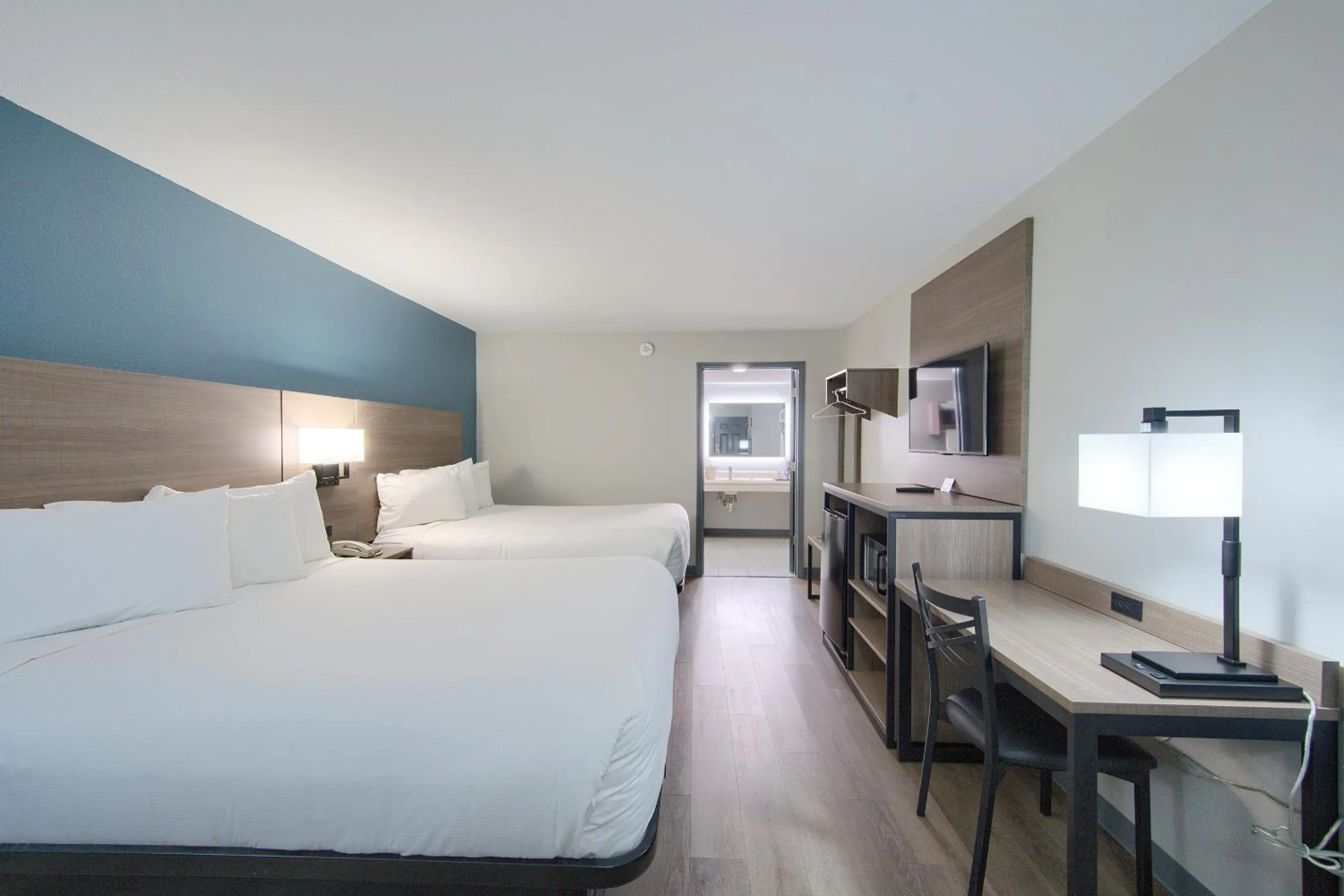 Photo of the whole room, Bed in Hot Springs Village Inn