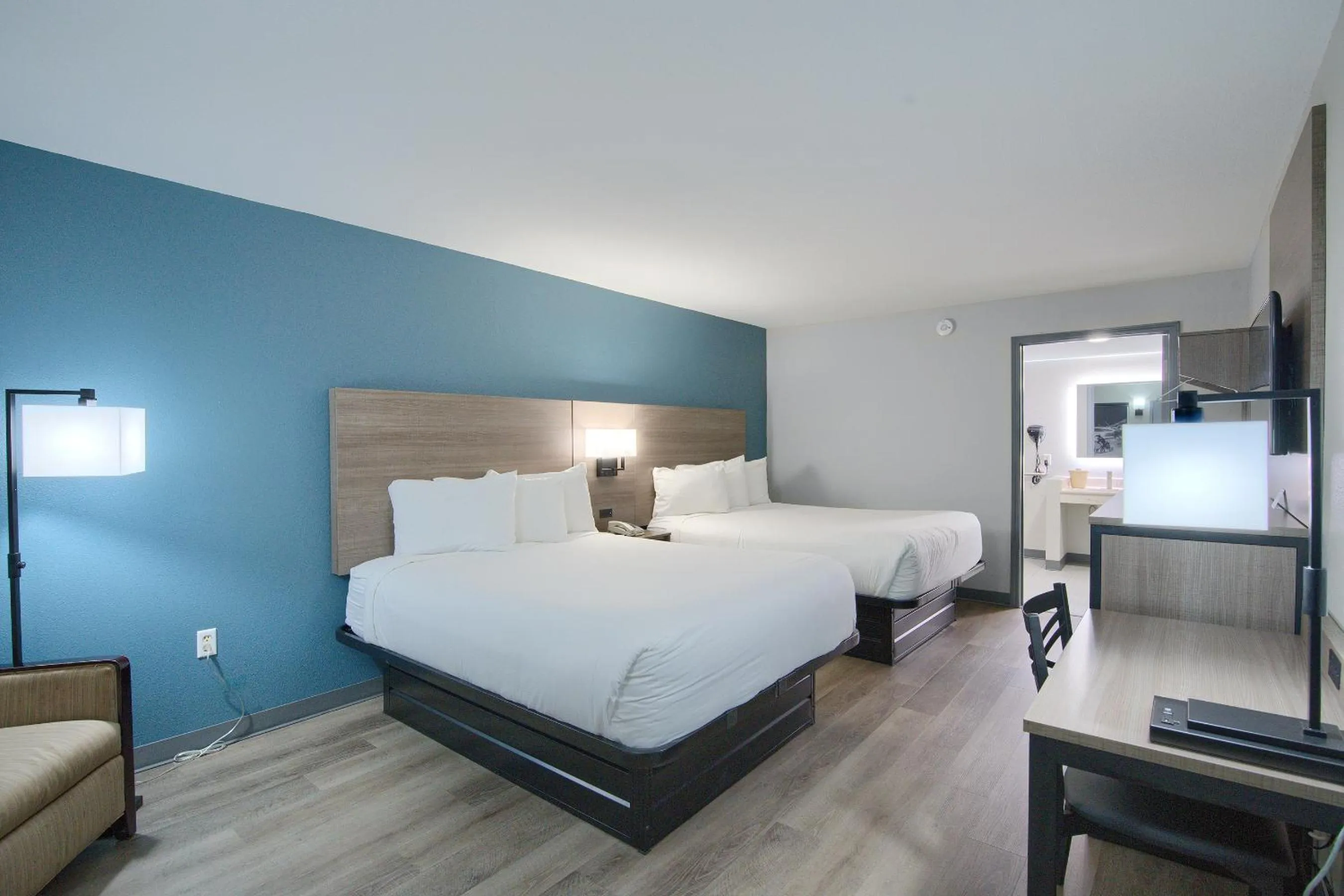 Photo of the whole room, Bed in Hot Springs Village Inn