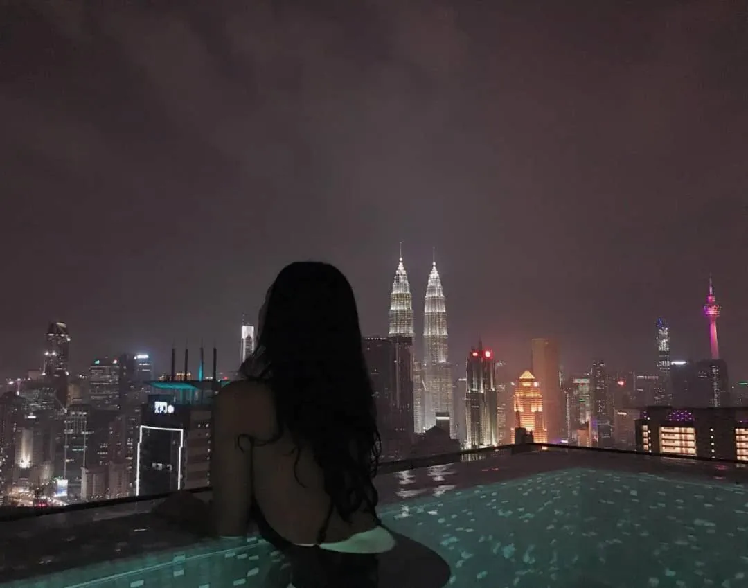 Swimming pool in Expressionz Professional Suites by AURORA SUMMER SUITES