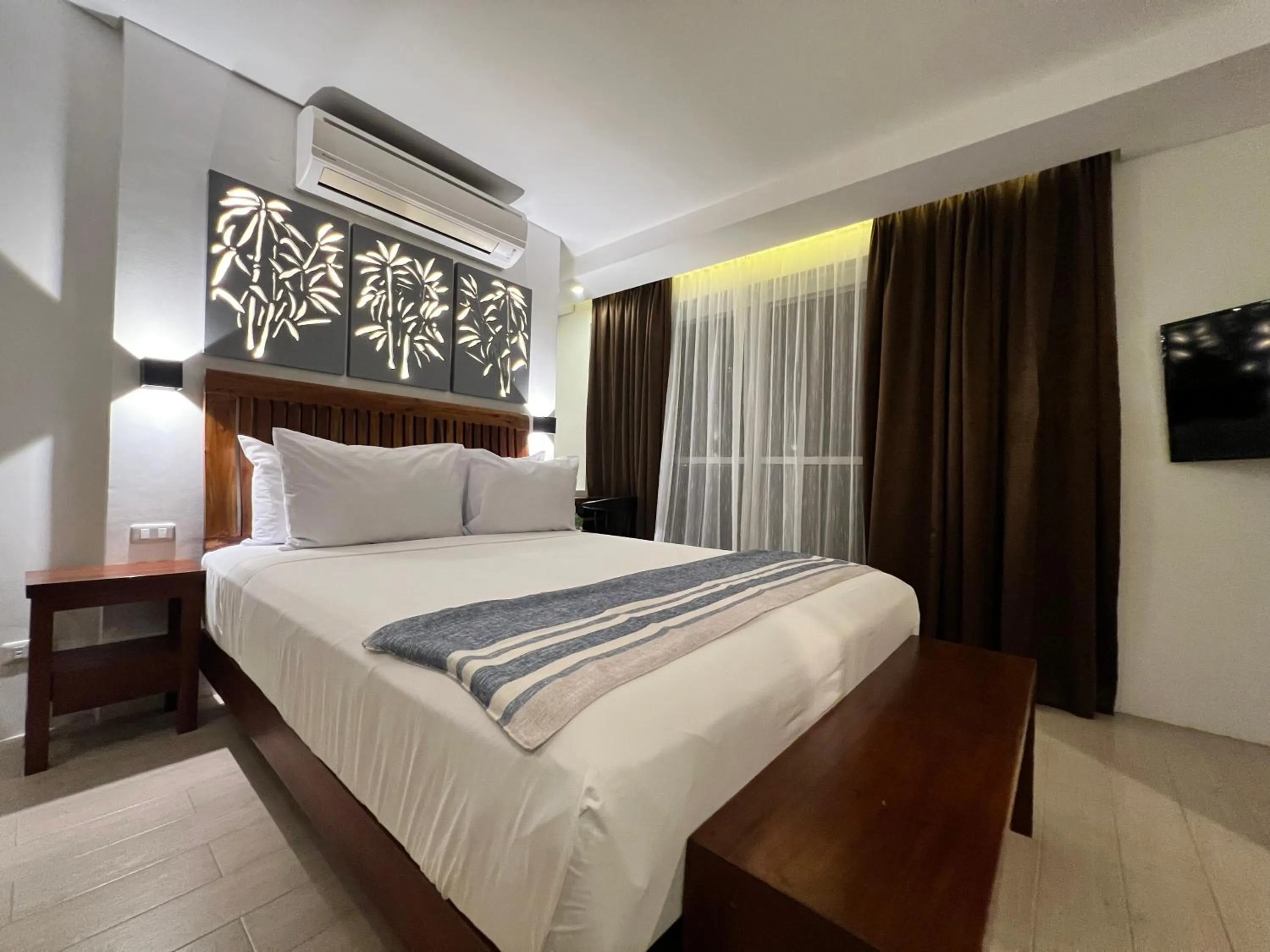 Bed in Aira Boracay Hotel