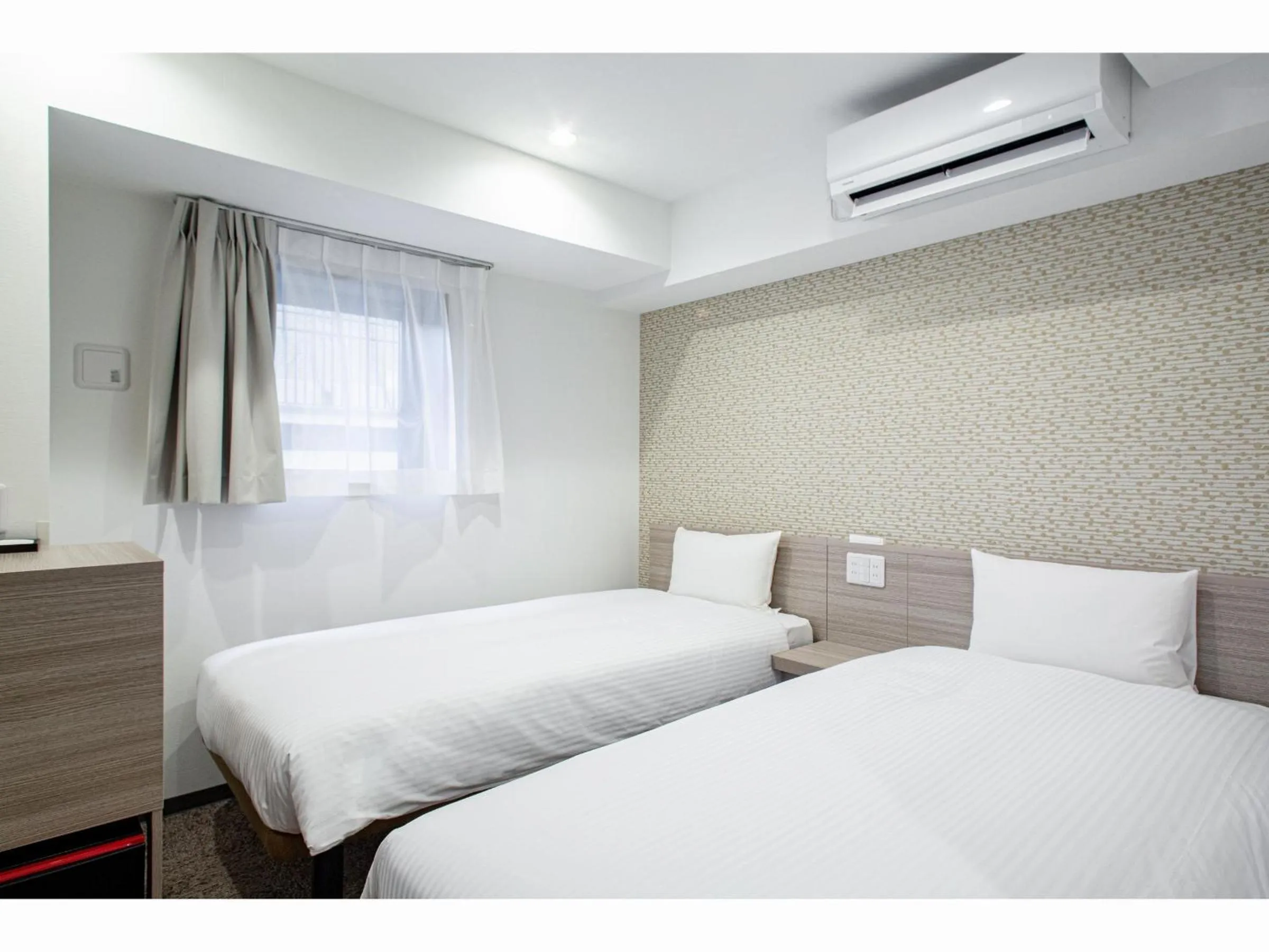 Bed in Kuretake Inn Premium Tajimi Ekimae