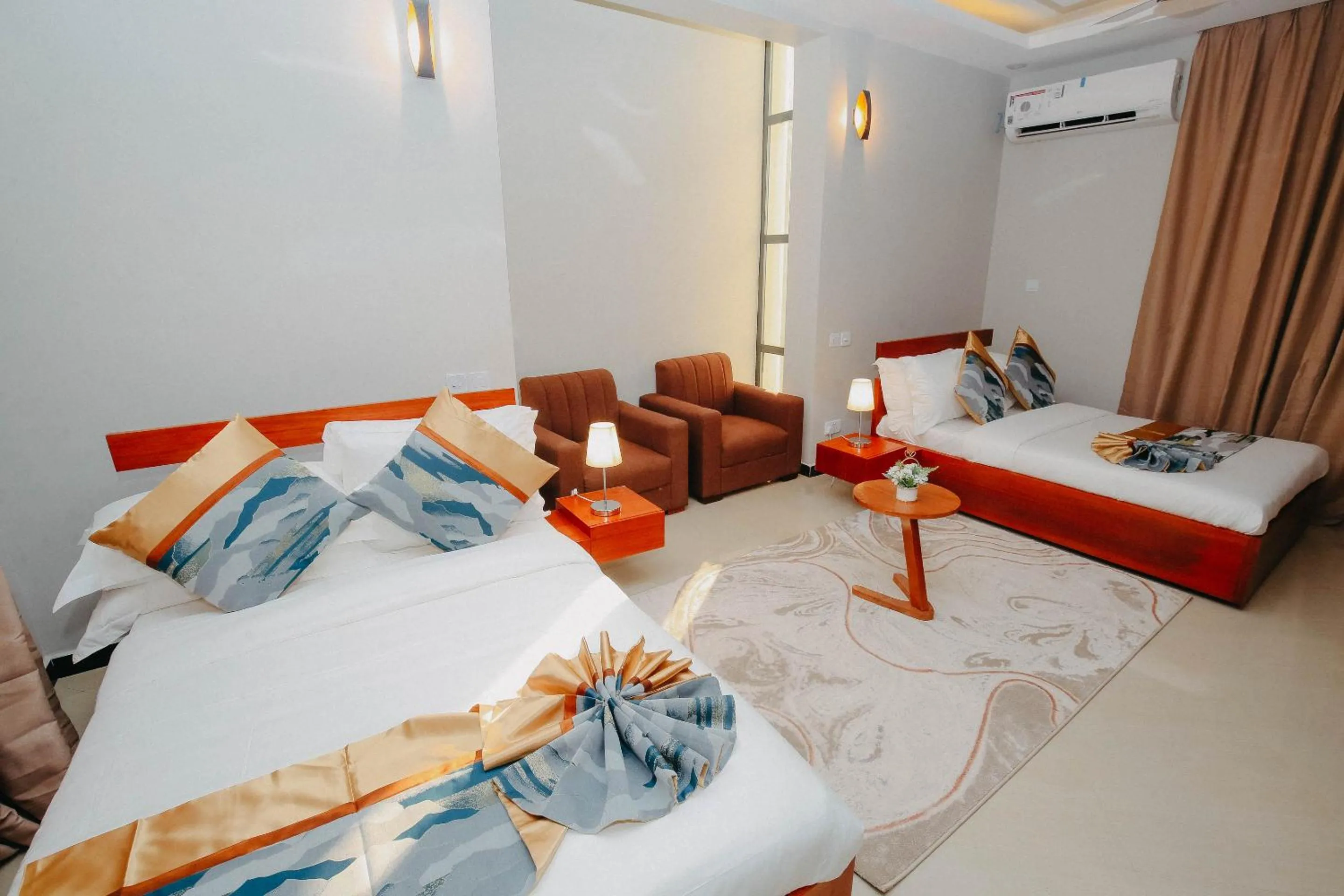 Bed in Inoga Luxury Hotel