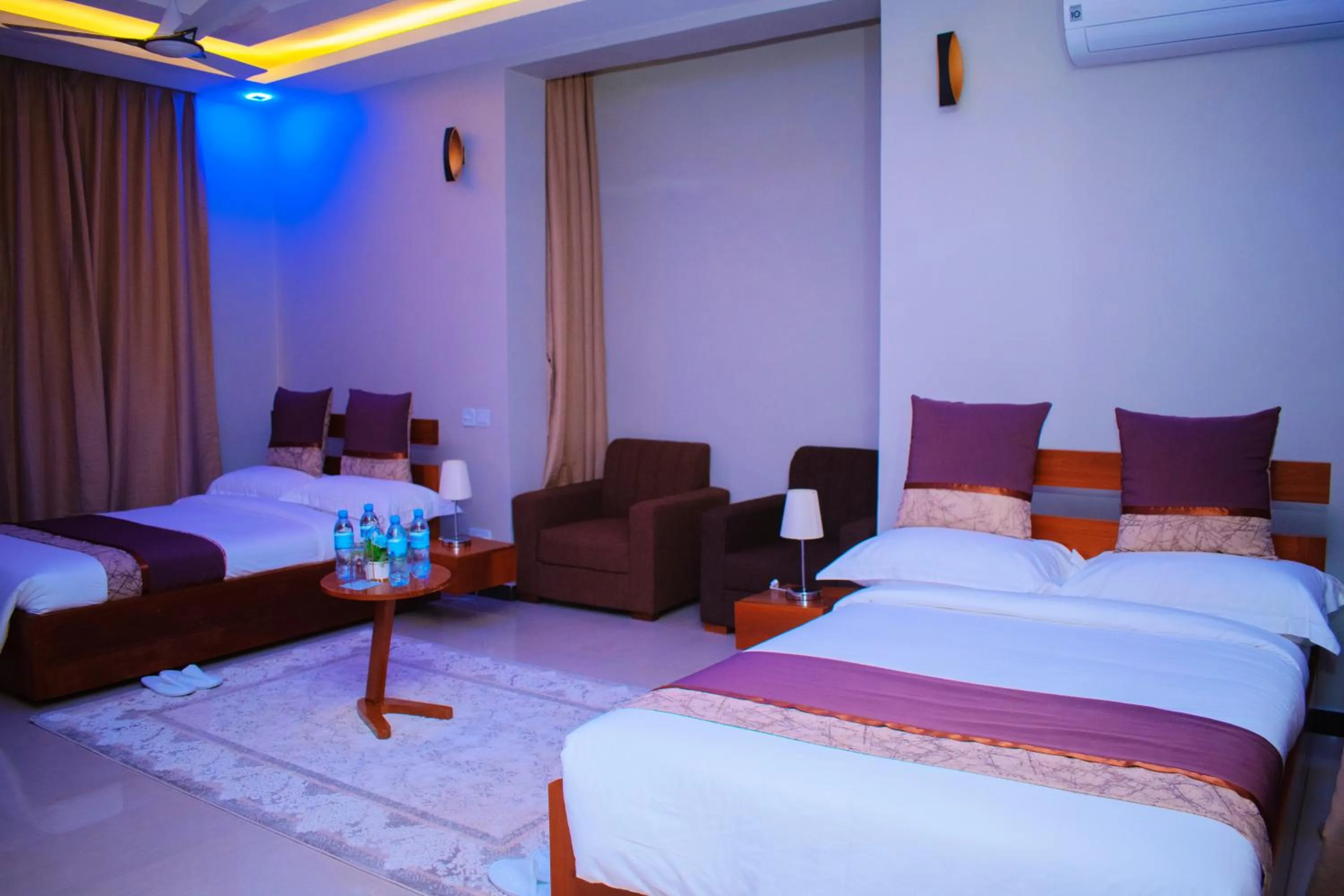 Bedroom in Inoga Luxury Hotel