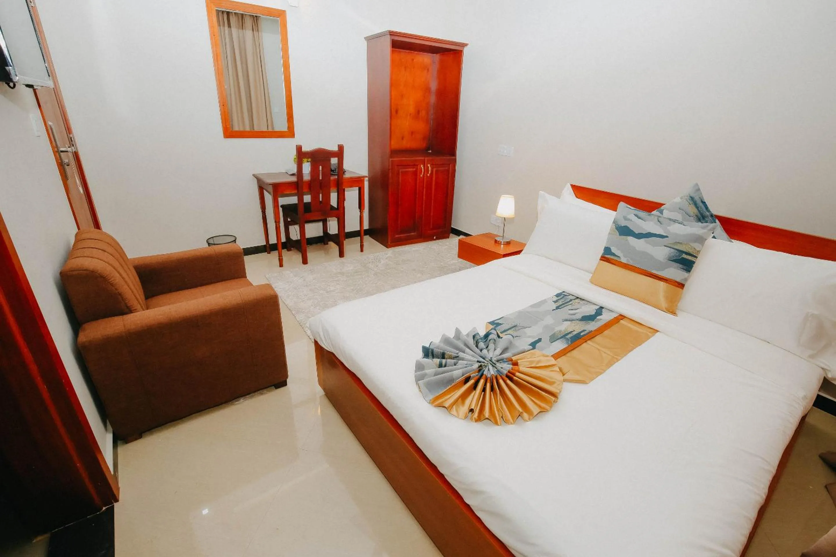 Bed in Inoga Luxury Hotel