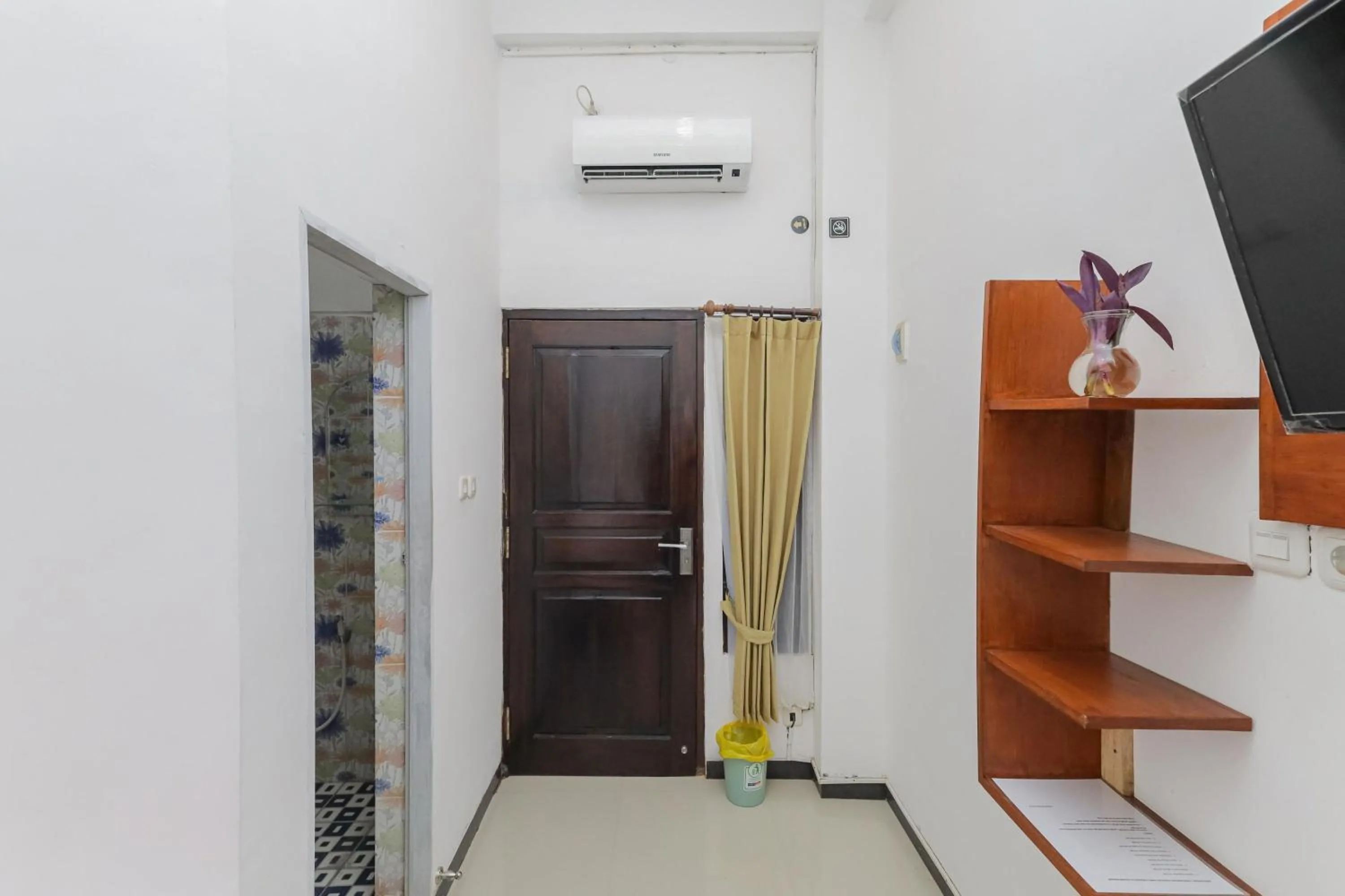 TV and multimedia in RedDoorz Syariah near Universitas Jember