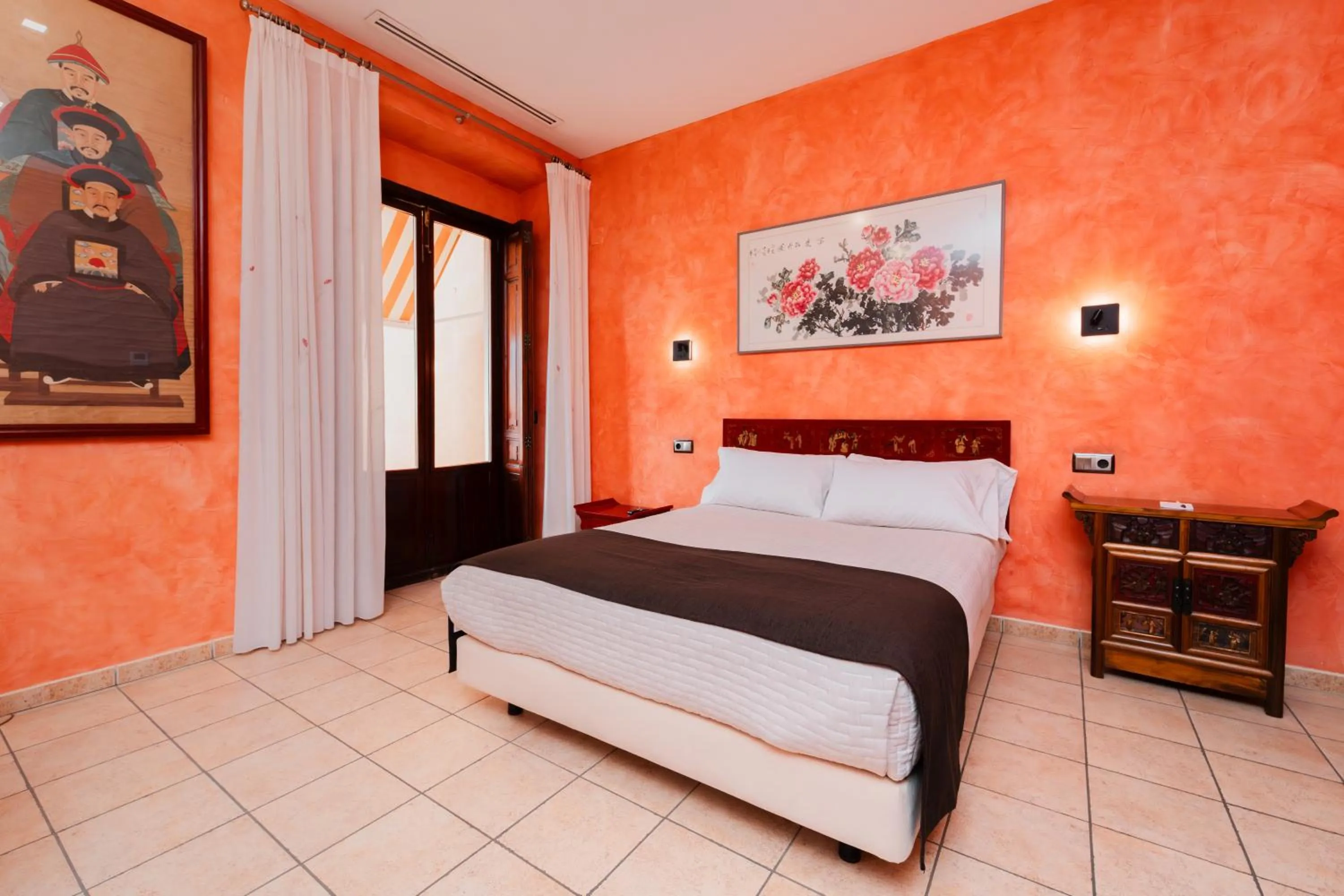 Bed in L'Agora Hotel