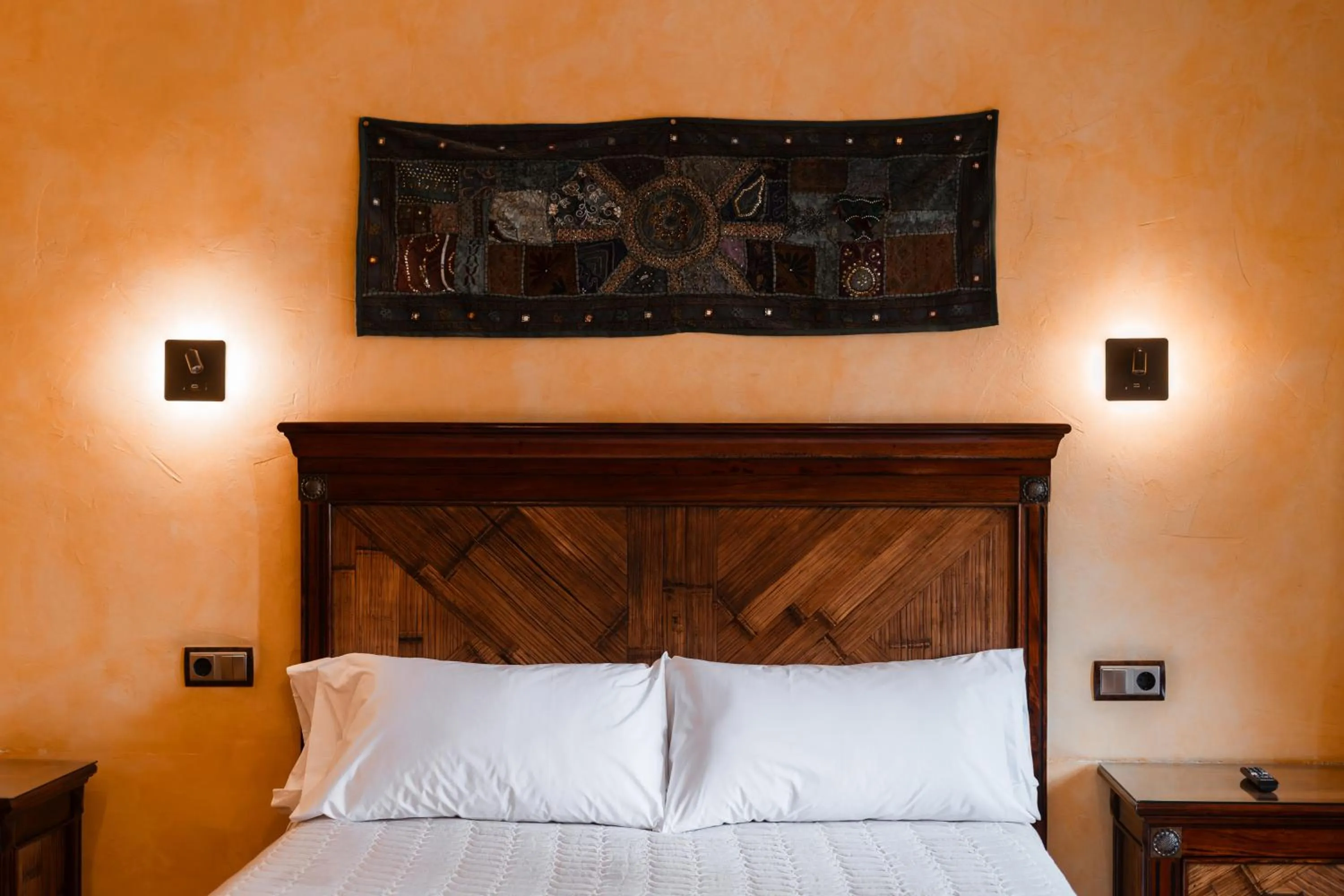 Bed in L'Agora Hotel