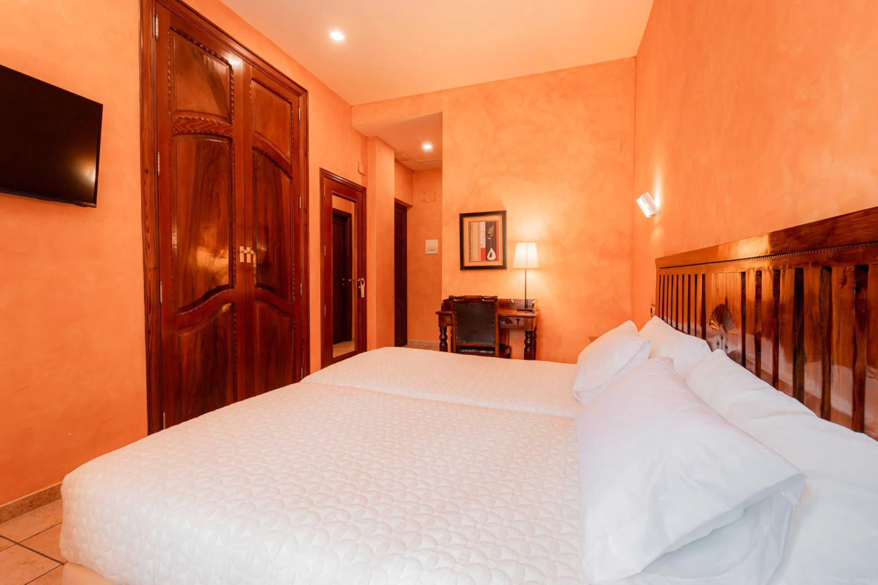 Bed in L'Agora Hotel