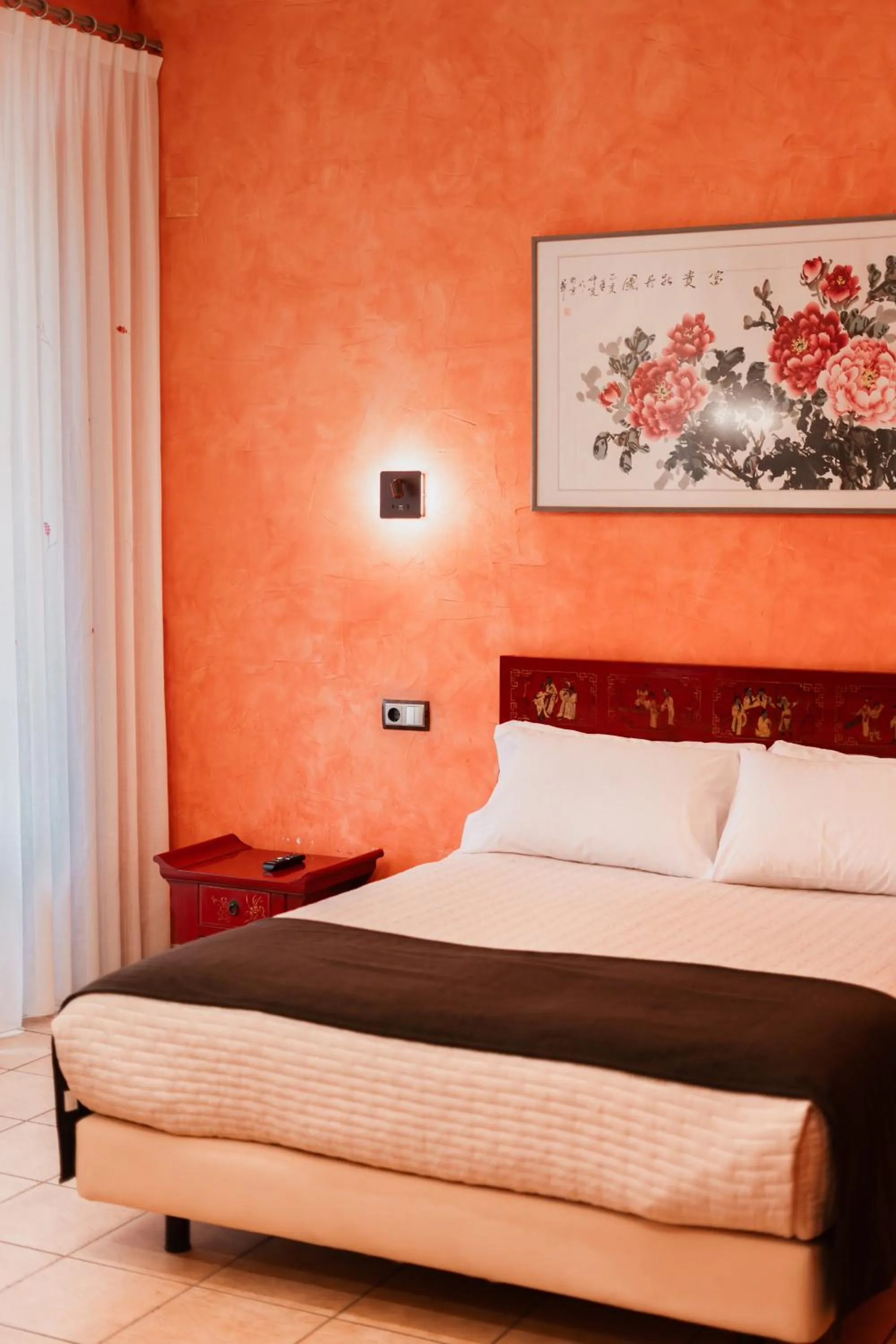 Bed in L'Agora Hotel