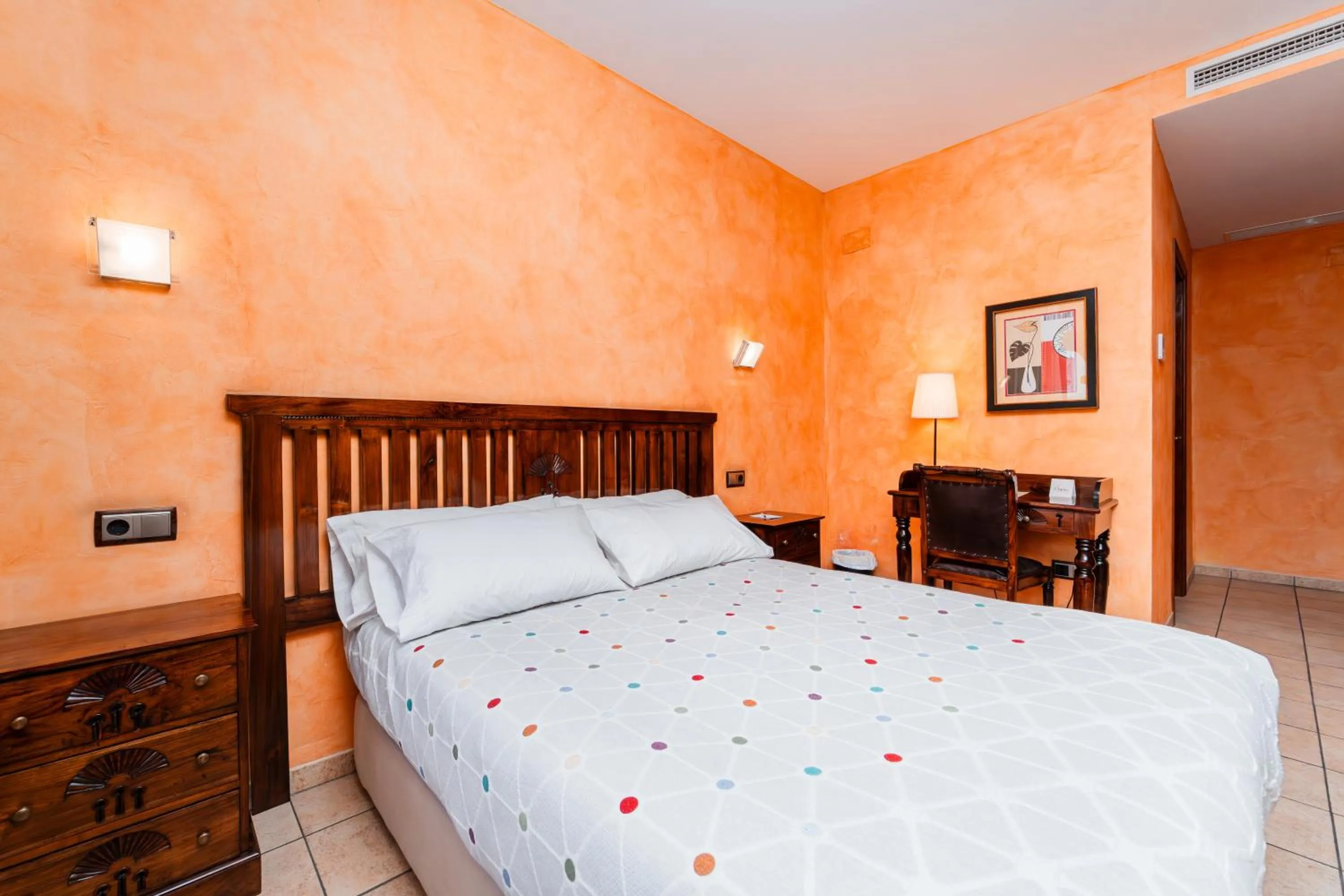 Bed in L'Agora Hotel