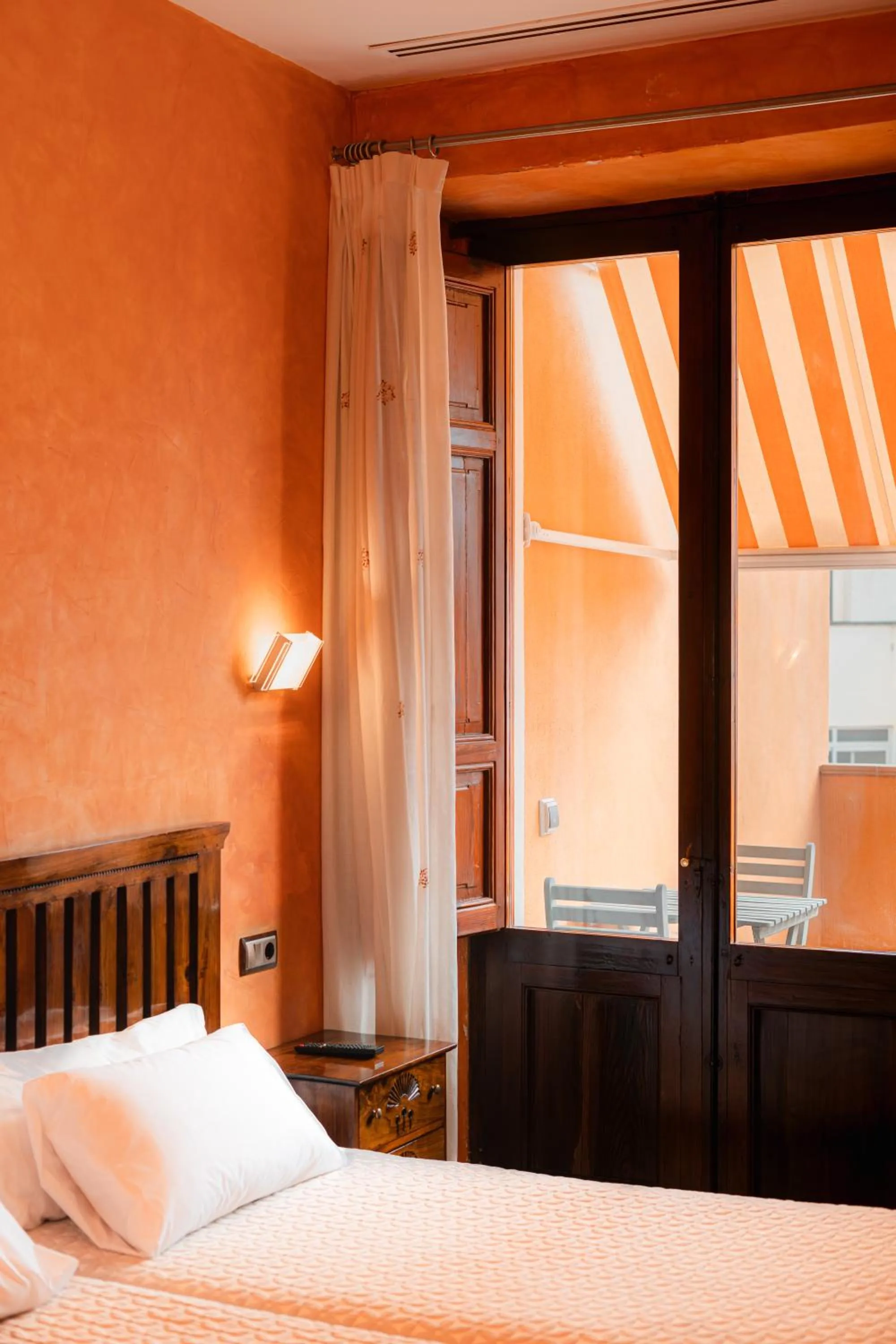 Bed in L'Agora Hotel