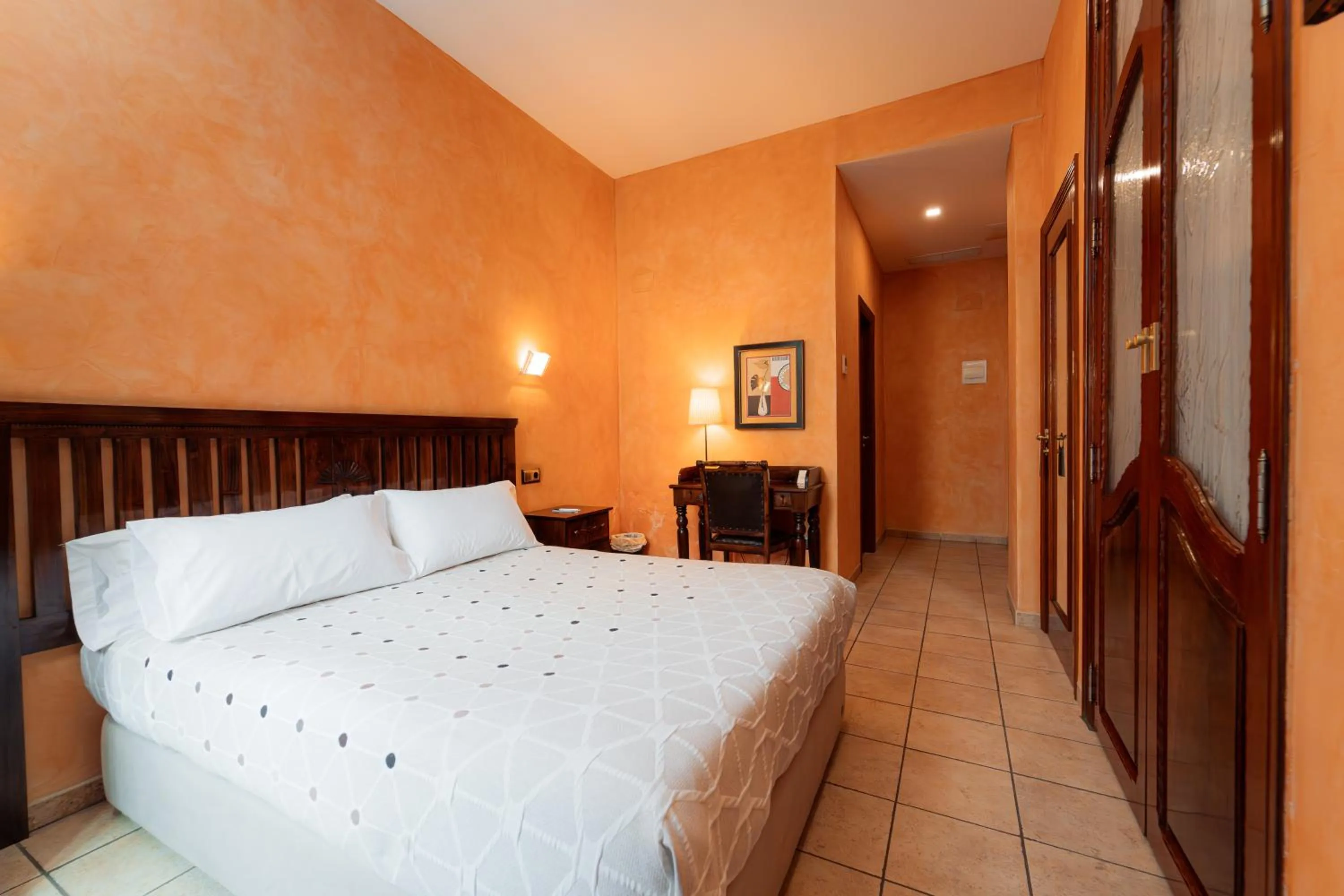 Bed in L'Agora Hotel